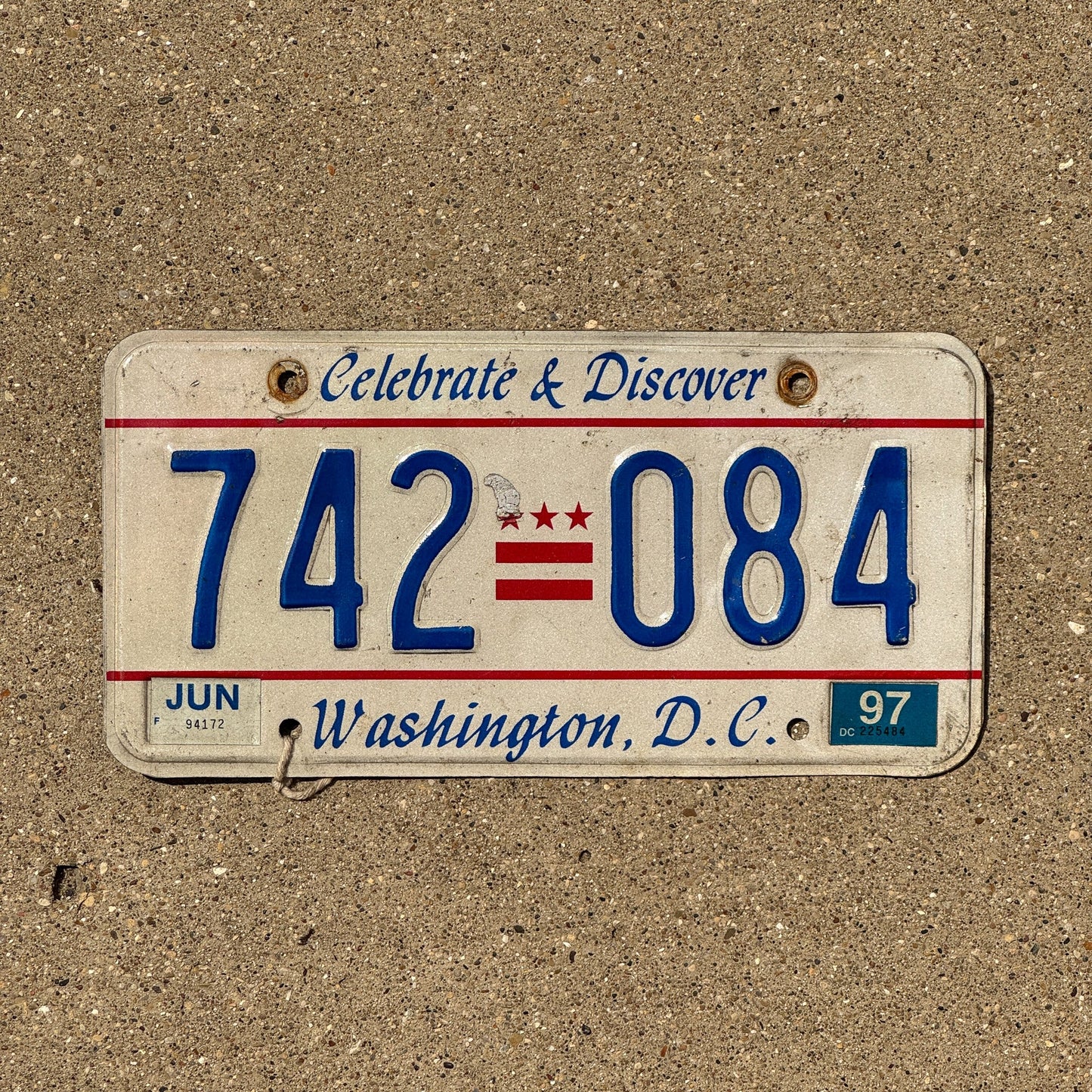Photo of a 1985 1997 Washington DC License Plate Auto Tag Garage Decor Vintage 742 084