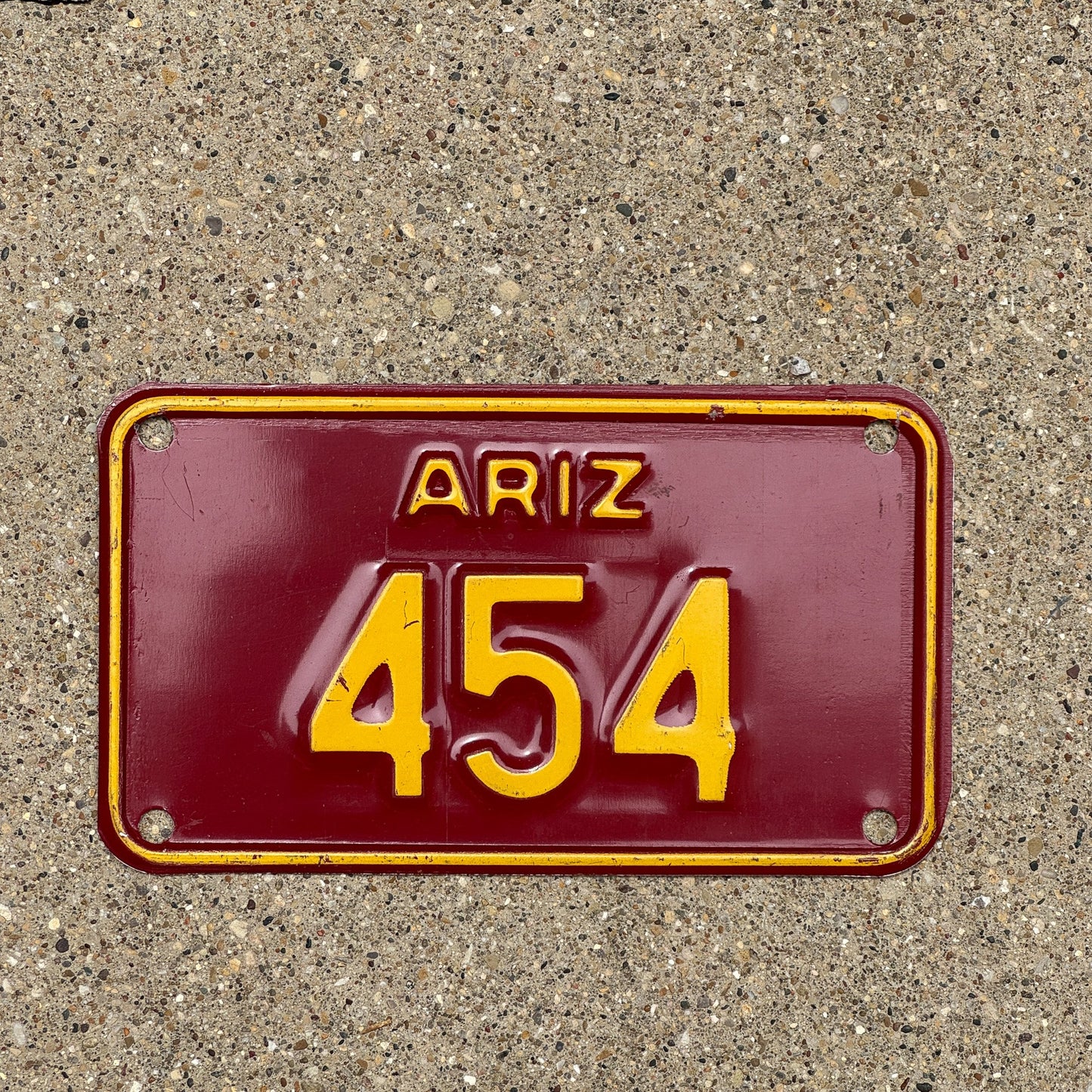 Photo of a 1985 Arizona Cotton Trailer License Plate Auto Tag Garage Decor Vintage Oddball Type 454