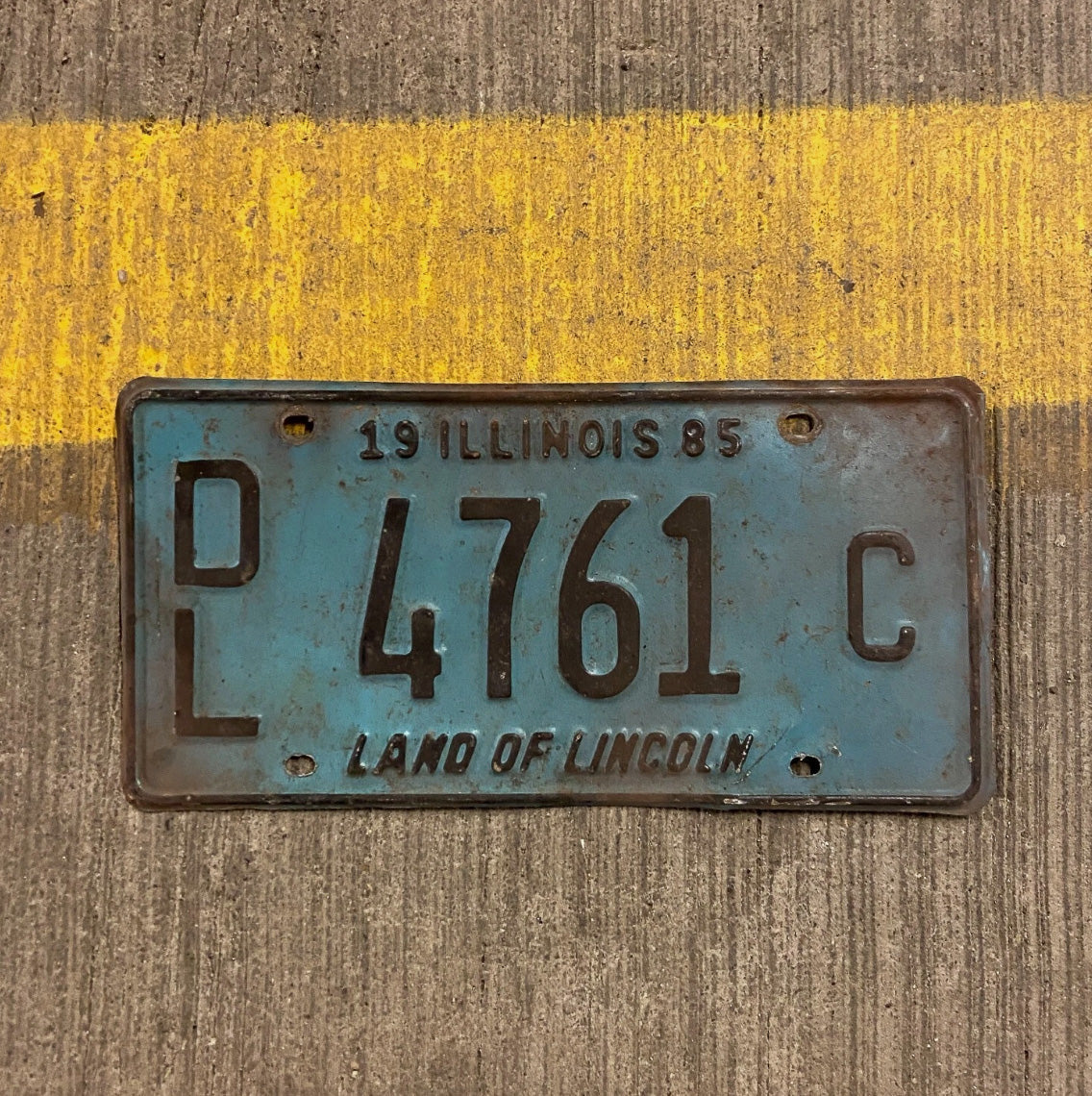 Photo of a 1985 Illinois Dealer License Plate Auto Tag Garage Decor Vintage 4761 C
