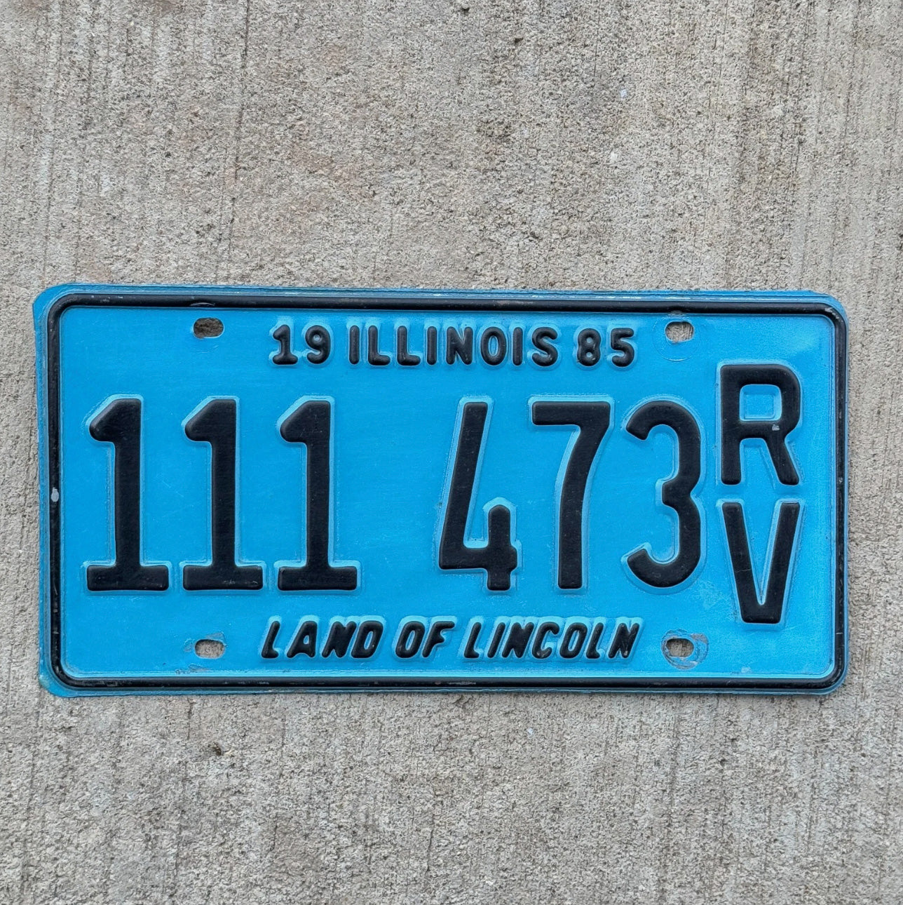 Photo of a 1985 Illinois RV License Plate Auto Tag Garage Decor Vintage Repeat Repeating 111 473