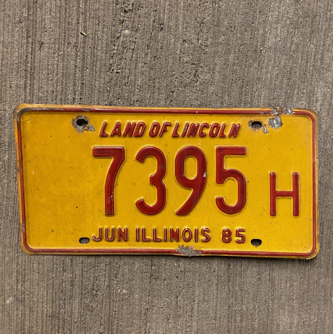 Photo of a 1985 Illinois Truck License Plate Auto Tag Garage Decor Vintage 7395 H