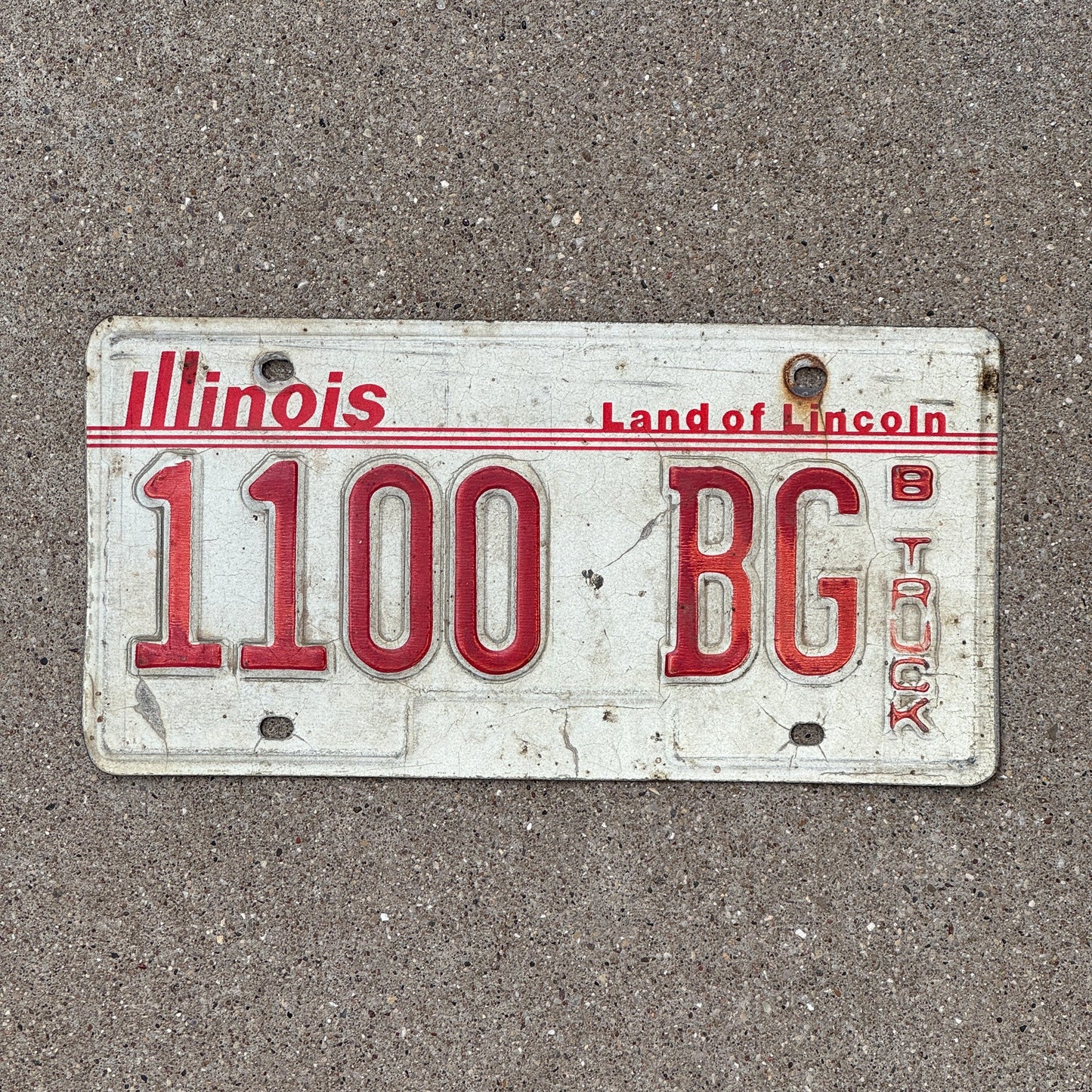 Photo of a 1985 Illinois TRUCK License Plate Auto Tag Garage Decor Vintage B Truck 1100 BG