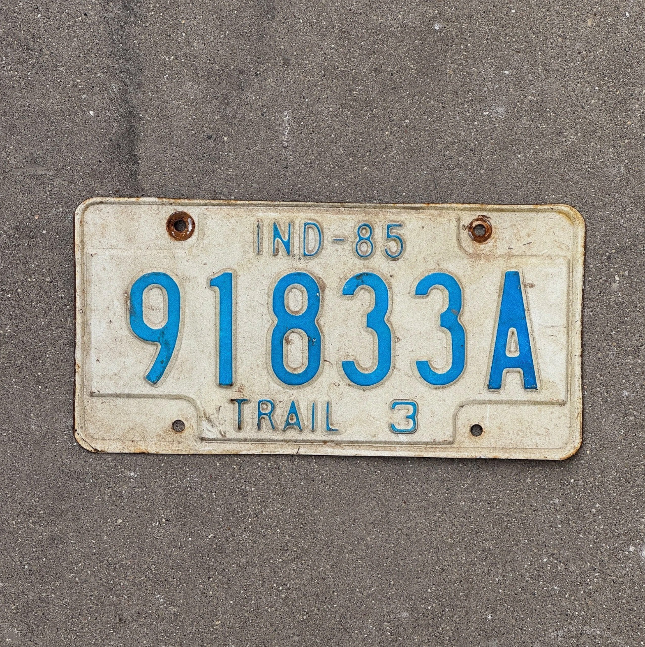 Photo of a 1985 Indiana Trailer License Plate Auto Tag Garage Decor 91833 A