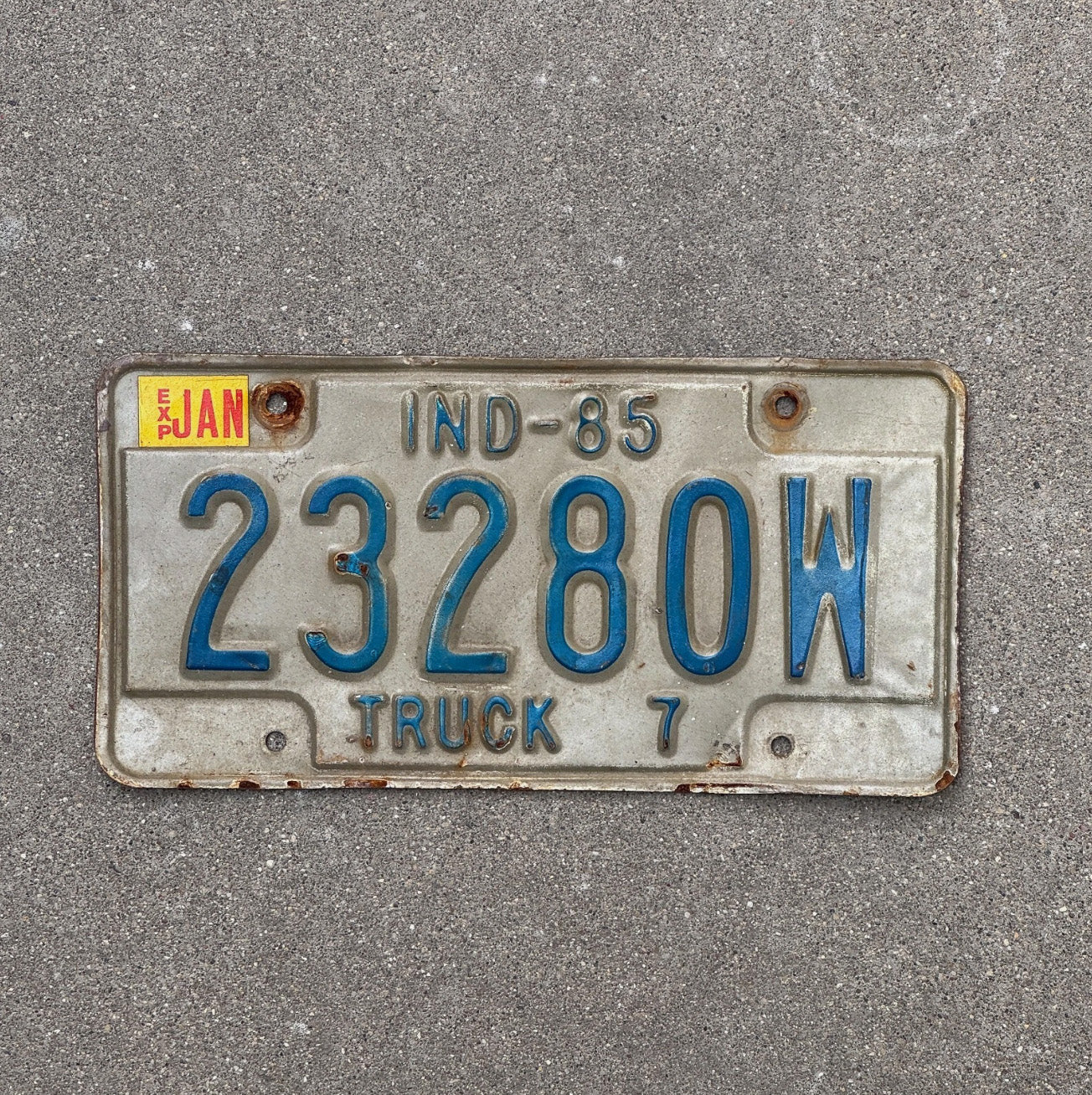 Photo of a 1985 Indiana Truck License Plate Auto Tag Garage Decor 23280 W