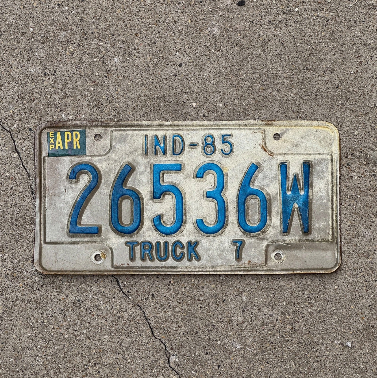 Photo of a 1985 Indiana Truck License Plate Auto Tag Garage Decor Vintage 26536 W