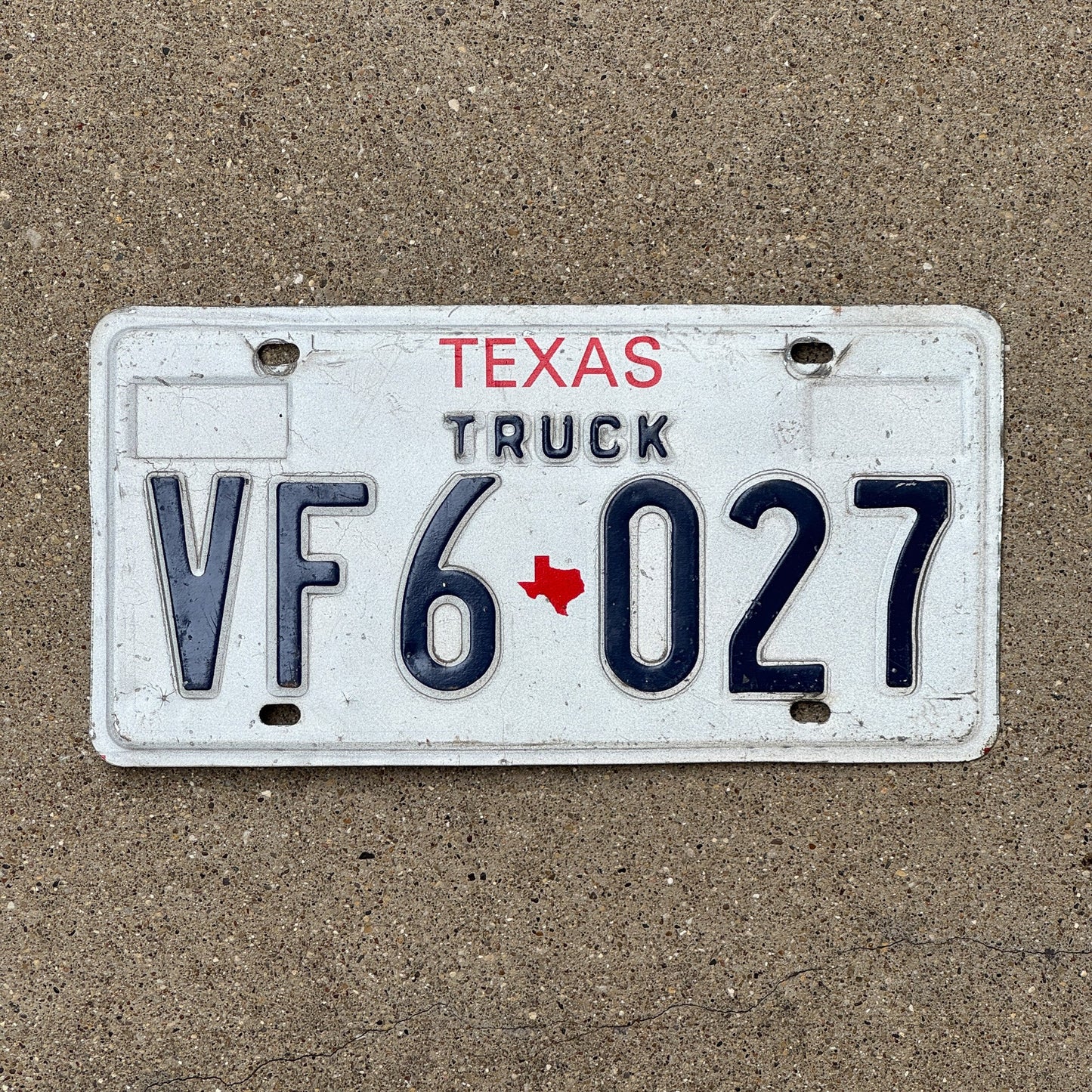Photo of a 1985 Texas Truck License Plate Auto Tag Garage Decor Vintage VF6 027