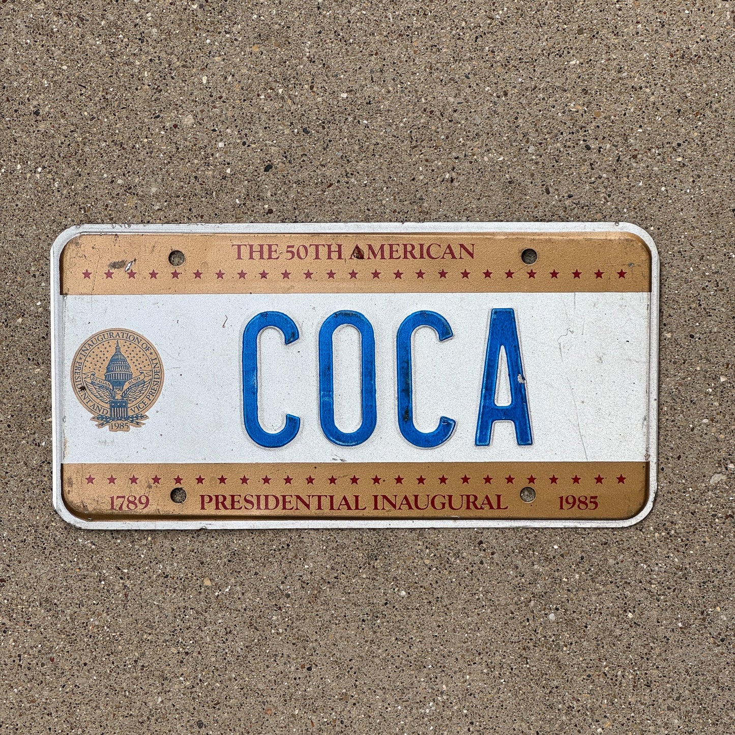 Photo of a 1985 Washington DC Inaugural License Plate Auto Tag Garage Decor Vintage President Cola Plant COCA
