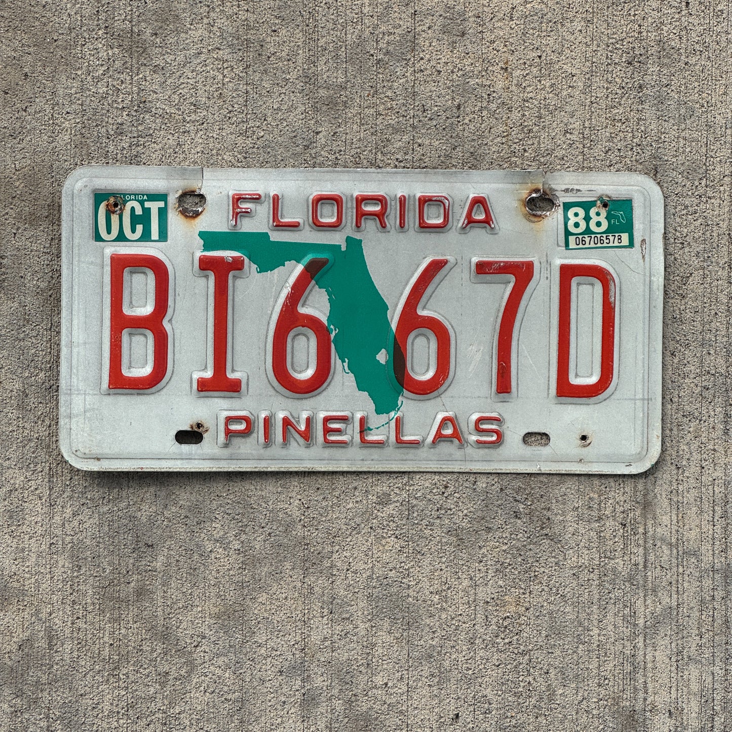 Photo of a 1986 1988 Florida Trailer License Plate Auto Tag Garage Decor Vintage BI 6 67D with original patina