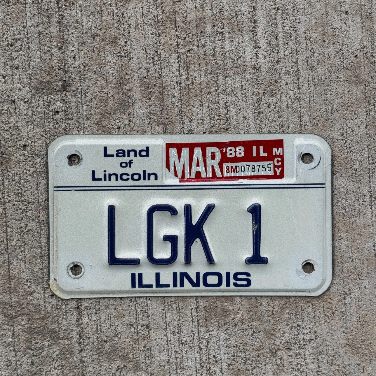 Photo of a 1986 1988 Illinois Vanity Motorcycle License Plate Auto Tag Garage Decor Vintage BMW Harley Honda LGK1