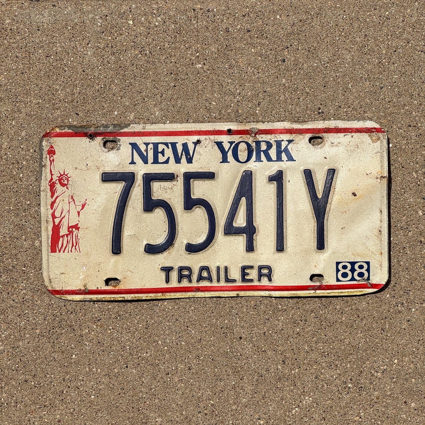 Photo of a 1986 1988 New York Trailer License Plate Auto Tag Garage Decor Vintage Liberty Base 75541 Y