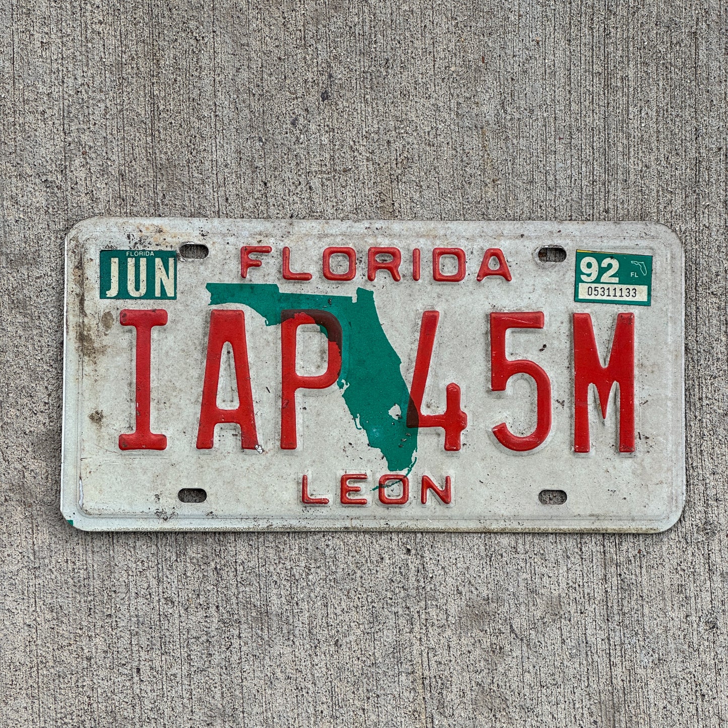 Photo of a 1986 1992 Florida License Plate Auto Tag Garage Decor Vintage IAP 45M with original patina