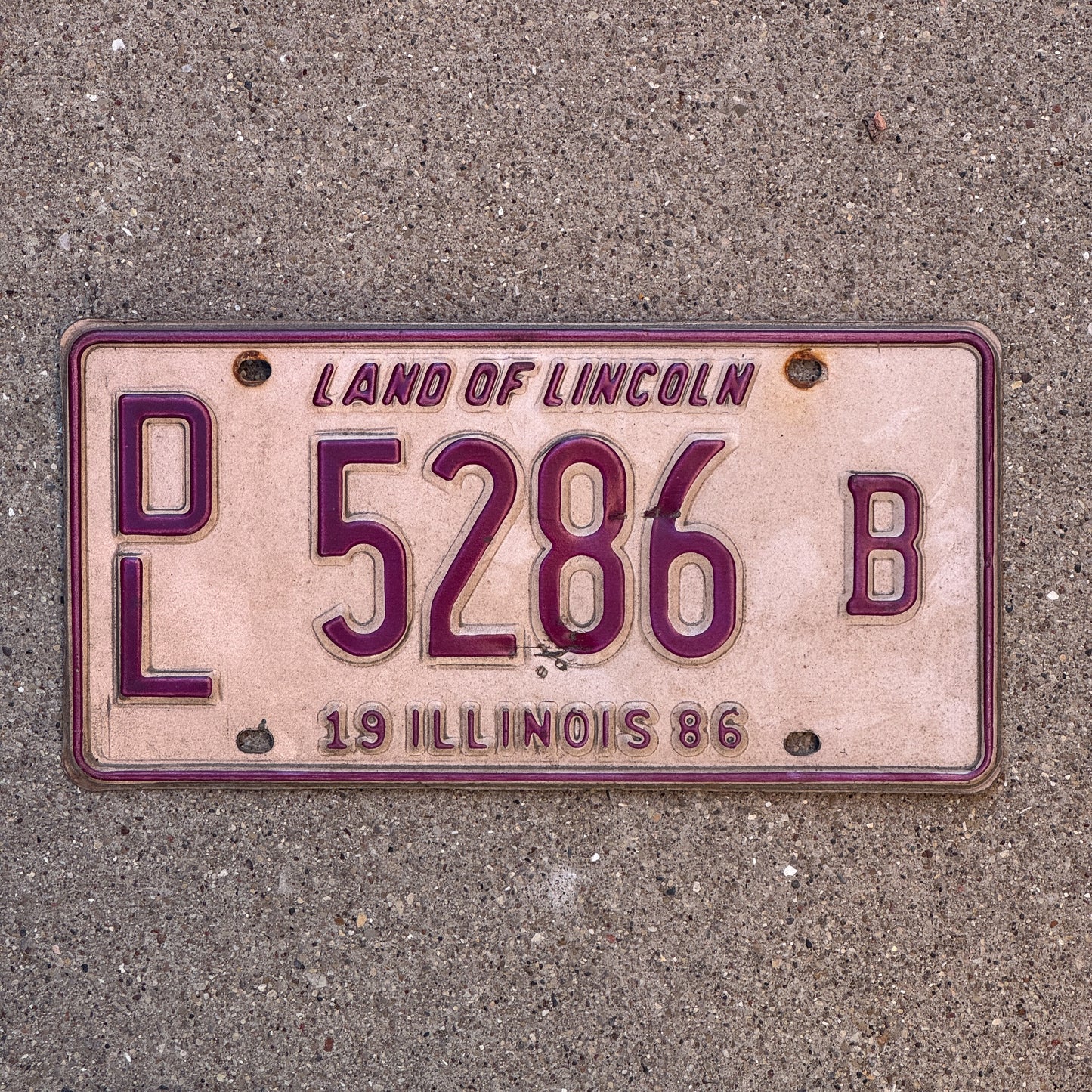 Photo of a 1986 Illinois Dealer License Plate Auto Tag 2 Vintage Garage 5286 B with original patina