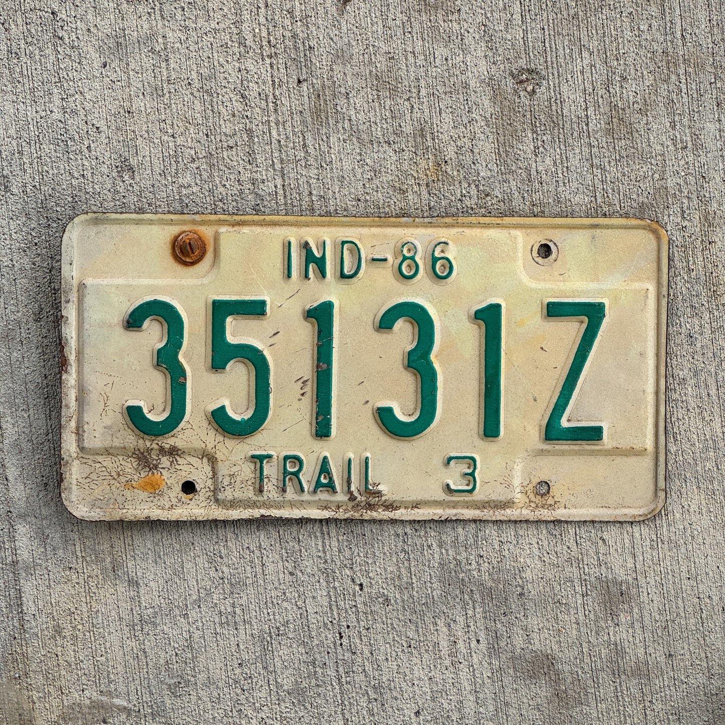 Photo of a 1986 Indiana Trailer License Plate Auto Tag Garage Decor Vintage 35131 Z with original patina