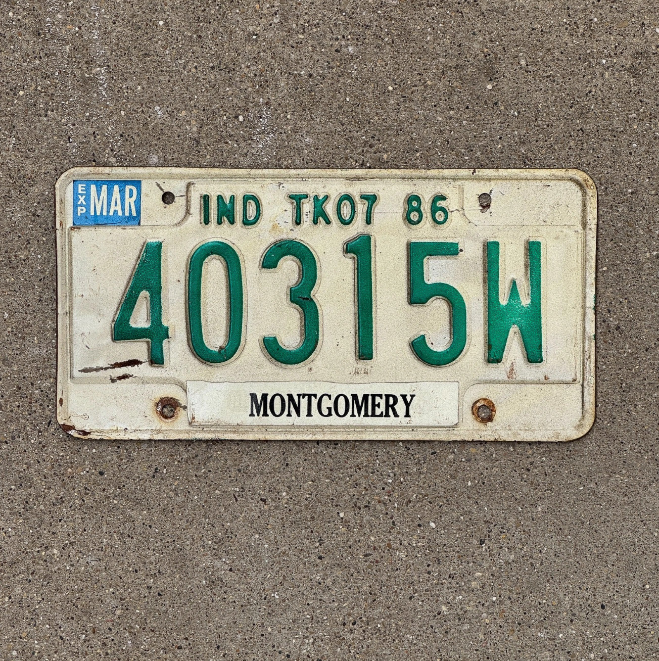 Photo of a 1986 Indiana Truck License Plate Auto Tag Garage Decor 40315 W