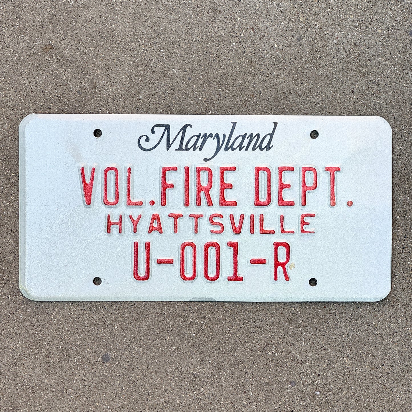 Photo of a 1986 Maryland Fire Department License Plate Auto Tag Garage Decor Vintage Hyattsville Low Number? U 001 R with original patina