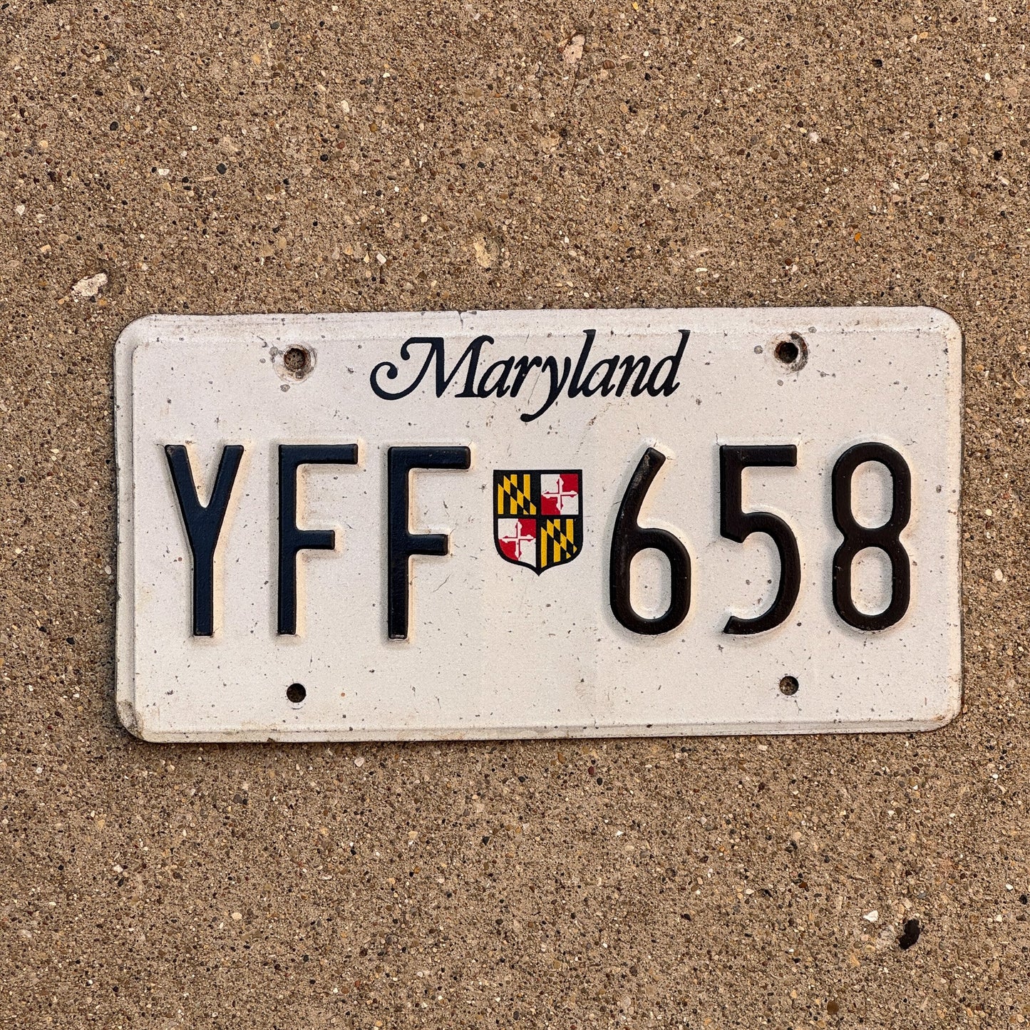 Photo of a 1986 Maryland License Plate Auto Tag Garage Decor Vintage YFF 658