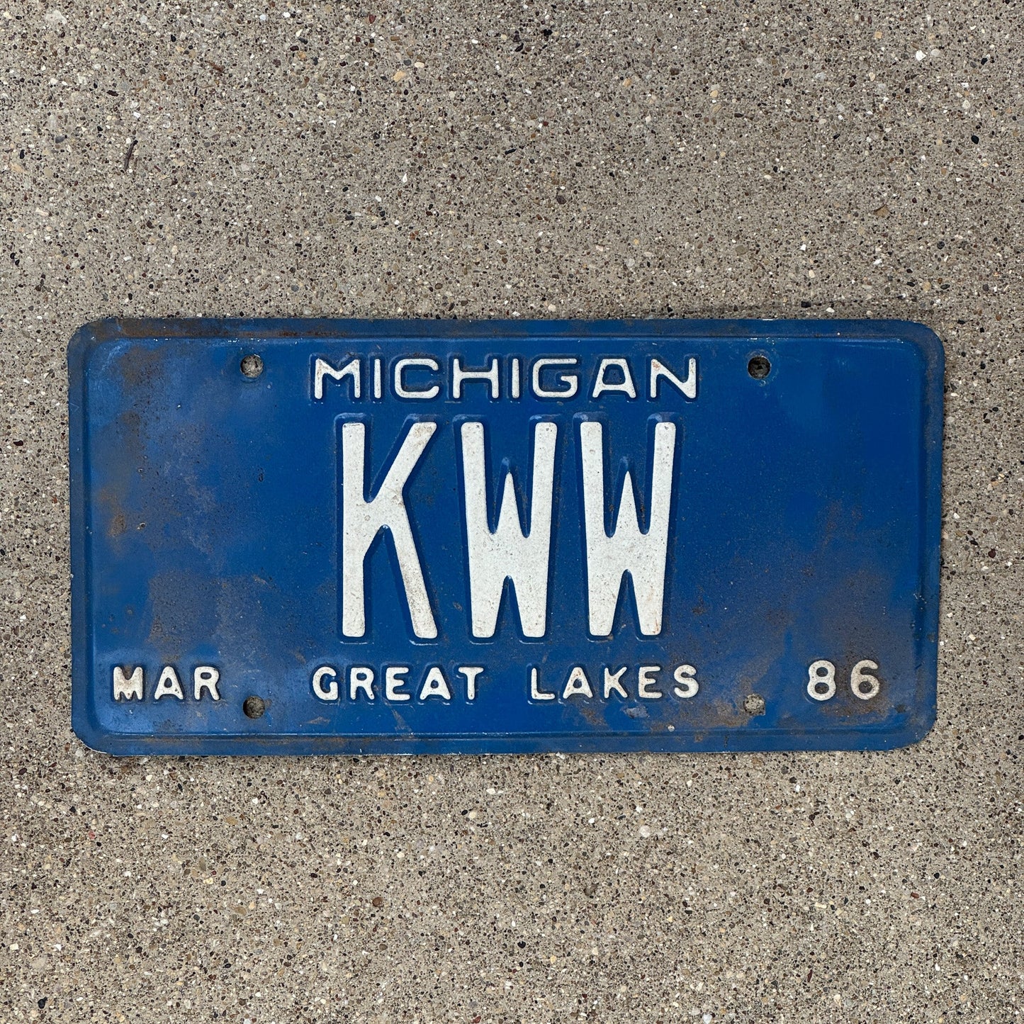 Photo of a 1986 Michigan Vanity License Plate Auto Tag Garage Decor Vintage KWW