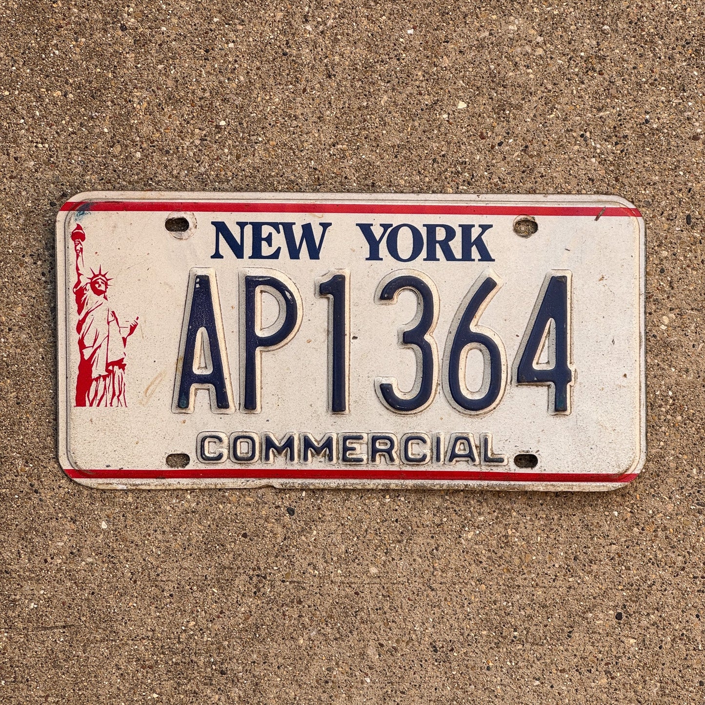 Photo of a 1986 New York COMMERCIAL License Plate Auto Tag Garage Decor Vintage Liberty Base AP 1364