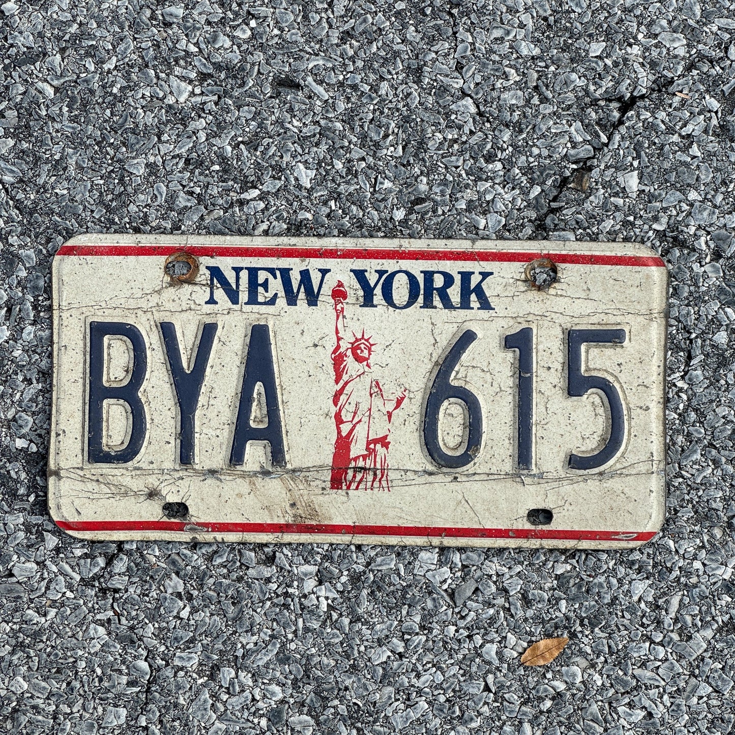 Photo of a 1986 New York License Plate Auto Tag Garage Decor Vintage Liberty Base BYA615