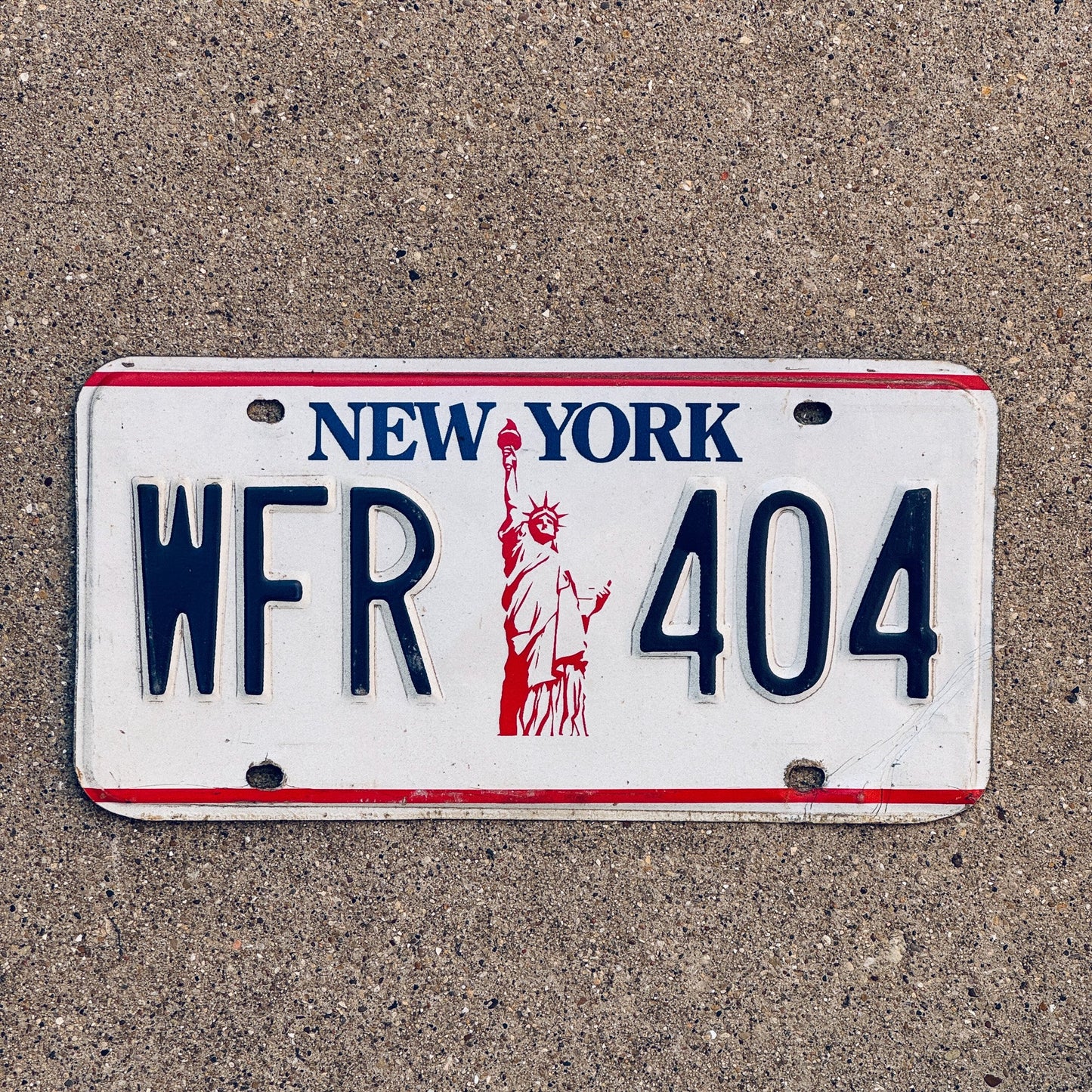 Photo of a 1986 New York License Plate Auto Tag Garage Decor Vintage Liberty Base WFR 404