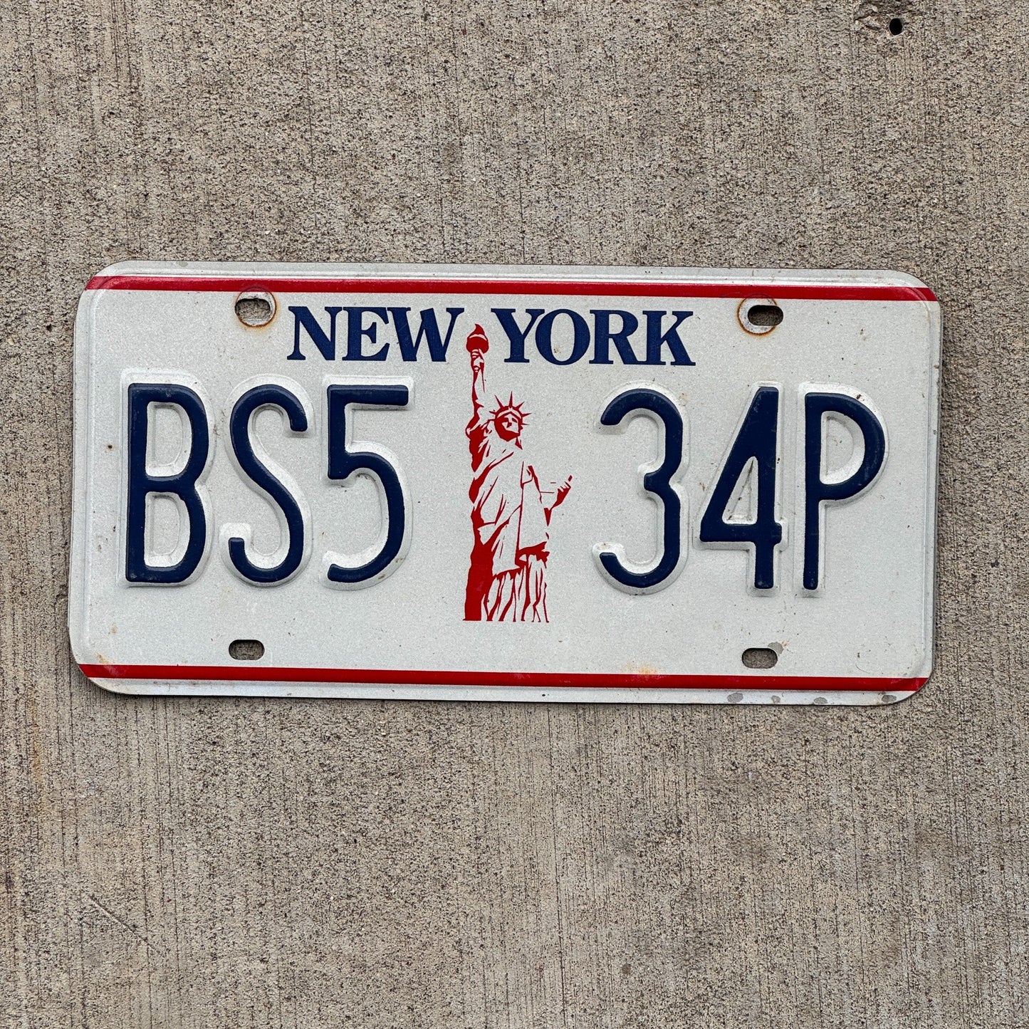 Photo of a 1986 New York License Plate Auto Tag Garage Decor Vintage Liberty, Tag 1 BS5 34P