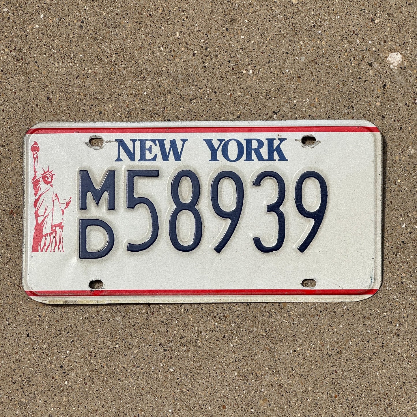 Photo of a 1986 New York Medical Doctor License Plate Auto Tag Garage Decor Vintage MD 58939