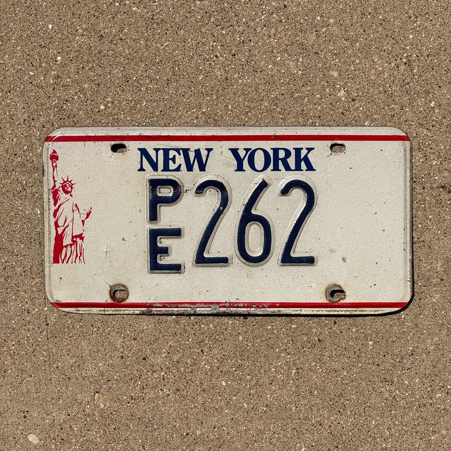 Photo of a 1986 New York Professional Engineer License Plate Auto Tag Garage Decor Vintage Liberty Base PE 262
