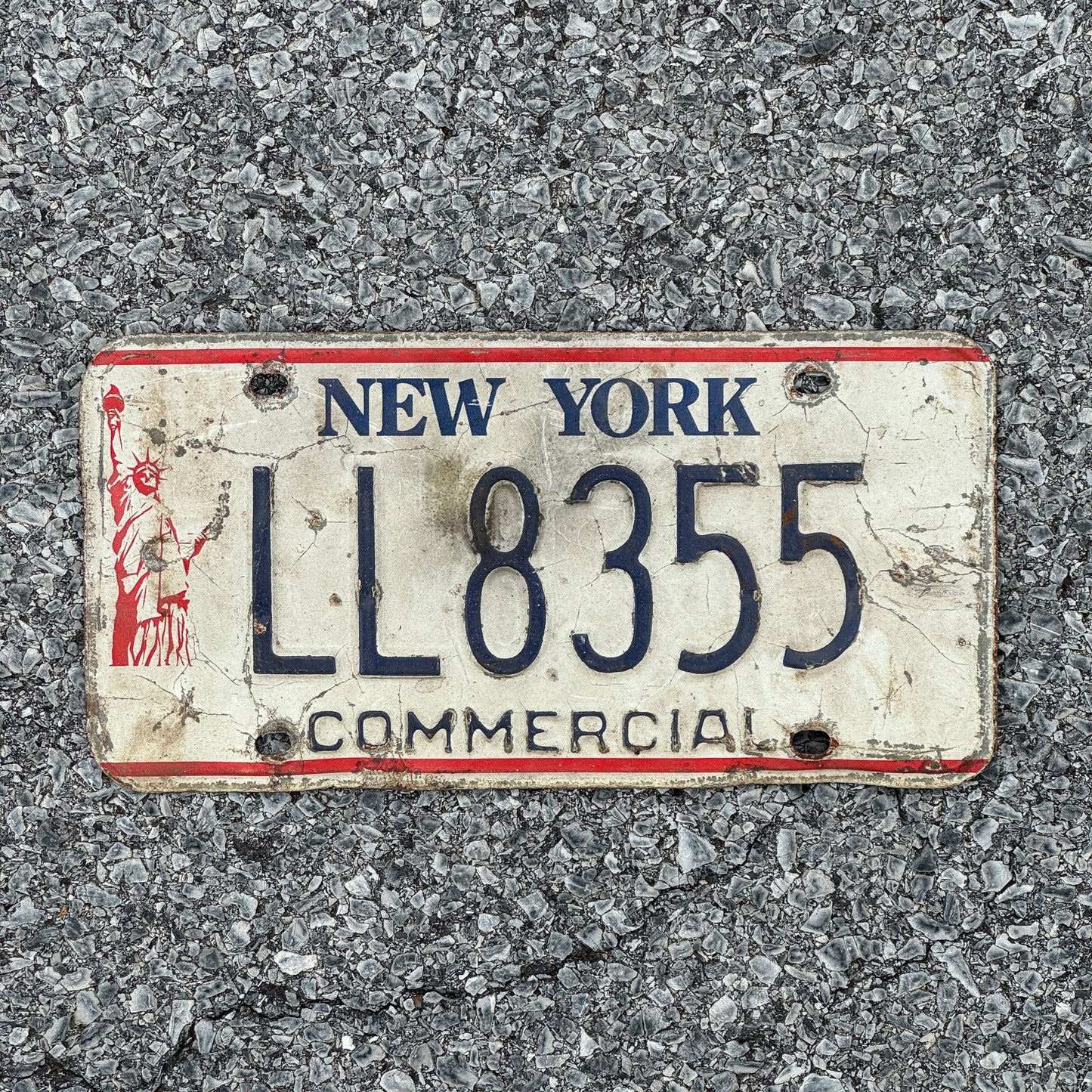 Photo of a 1986 New York Truck License Plate Auto Tag Garage Decor Vintage Liberty Base LL8355