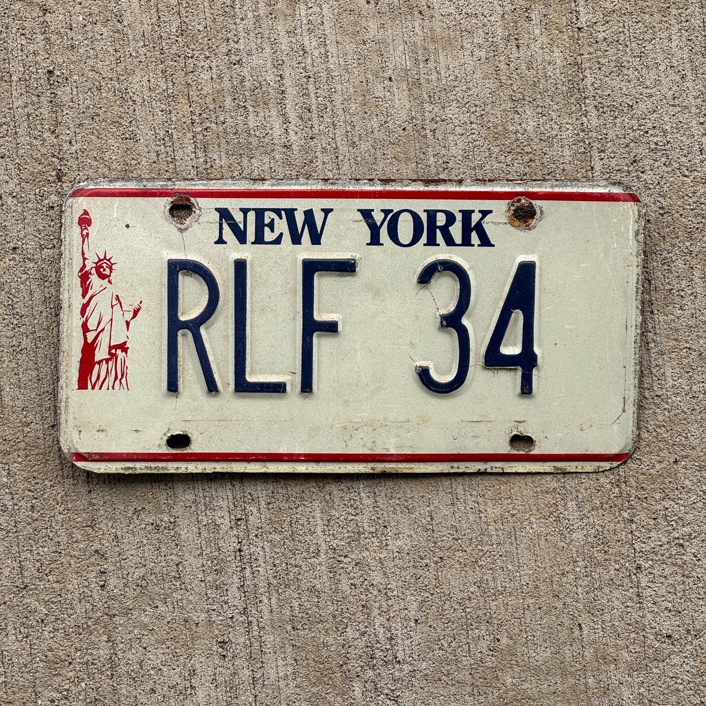 Photo of a 1986 New York VANITY License Plate Auto Tag Garage Decor Vintage Liberty Tag 2 RLF 34
