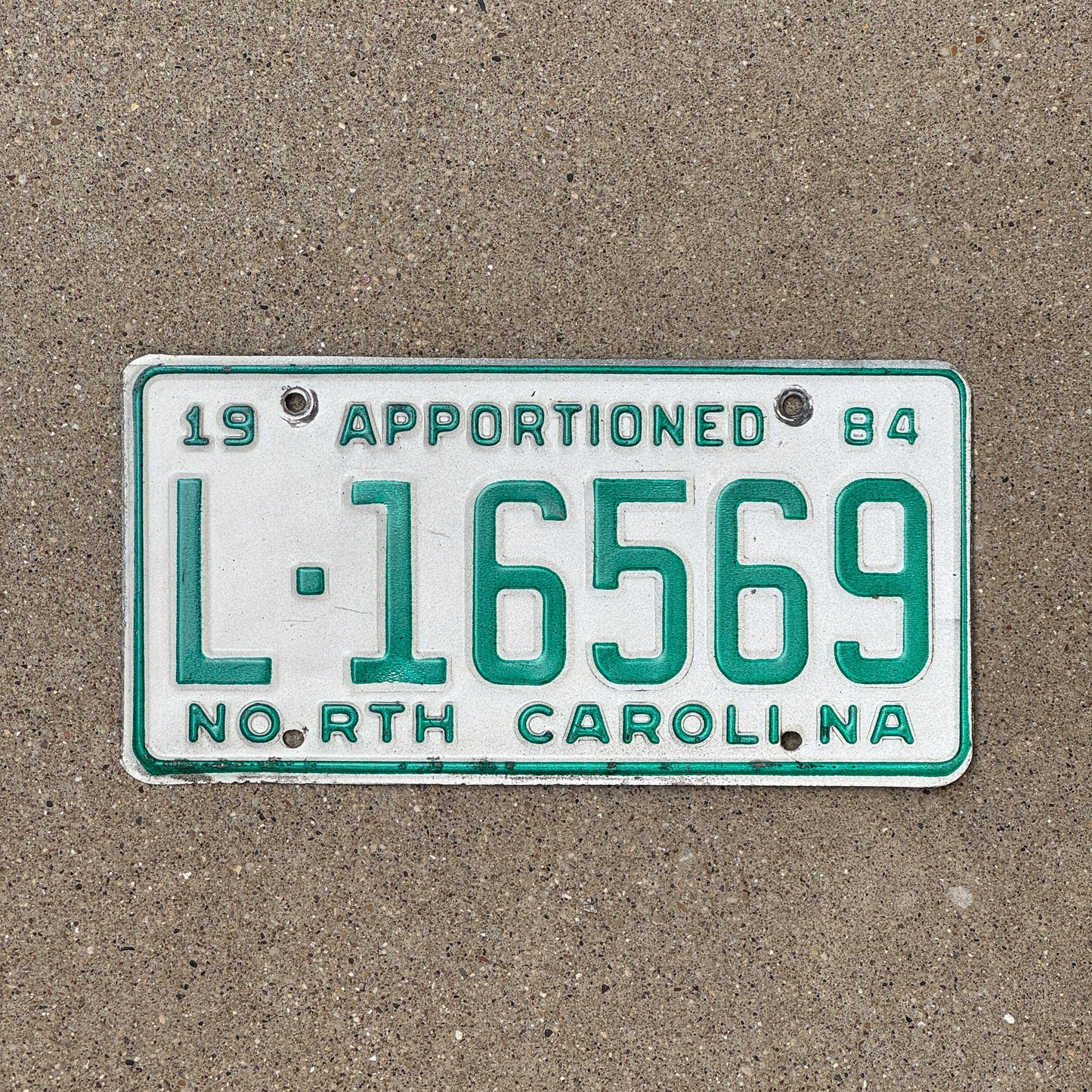 Photo of a 1986 North Carolina Apportioned License Plate Auto Tag Garage Decor Vintage L 16569