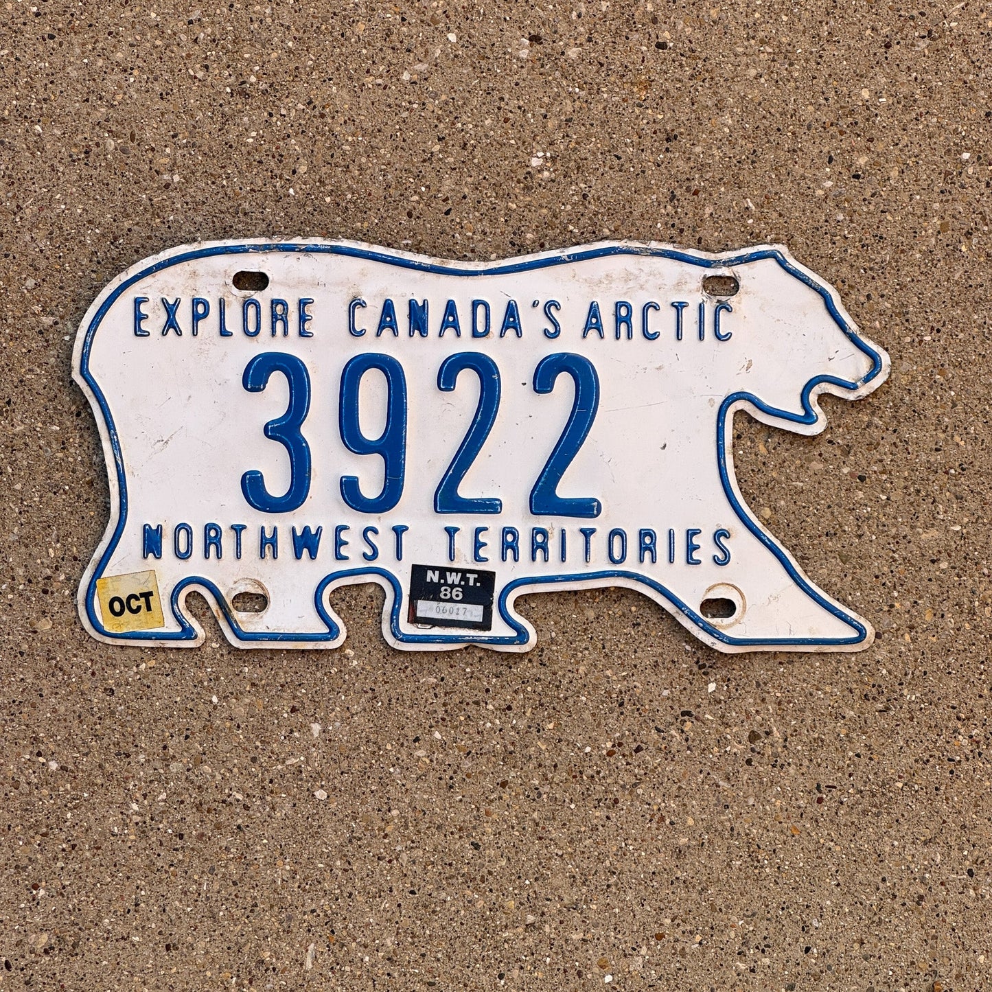 Photo of a 1986 Northwest Territories License Plate Auto Tag Garage Decor Vintage Four Digit Polar Bear 3922