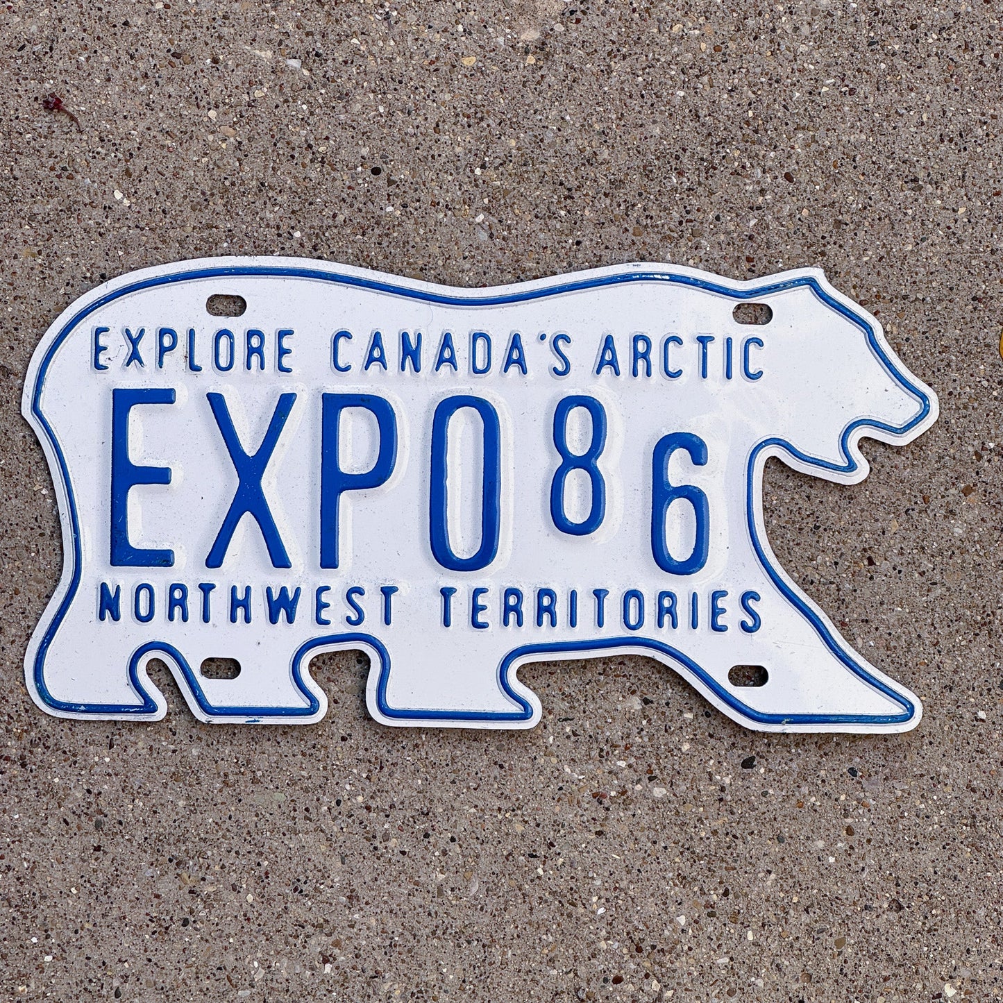 Photo of a 1986 Northwest Territories License Plate Auto Tag Garage Decor Vintage Vancouver Expo 86 Souvenir Bear EXPO 86