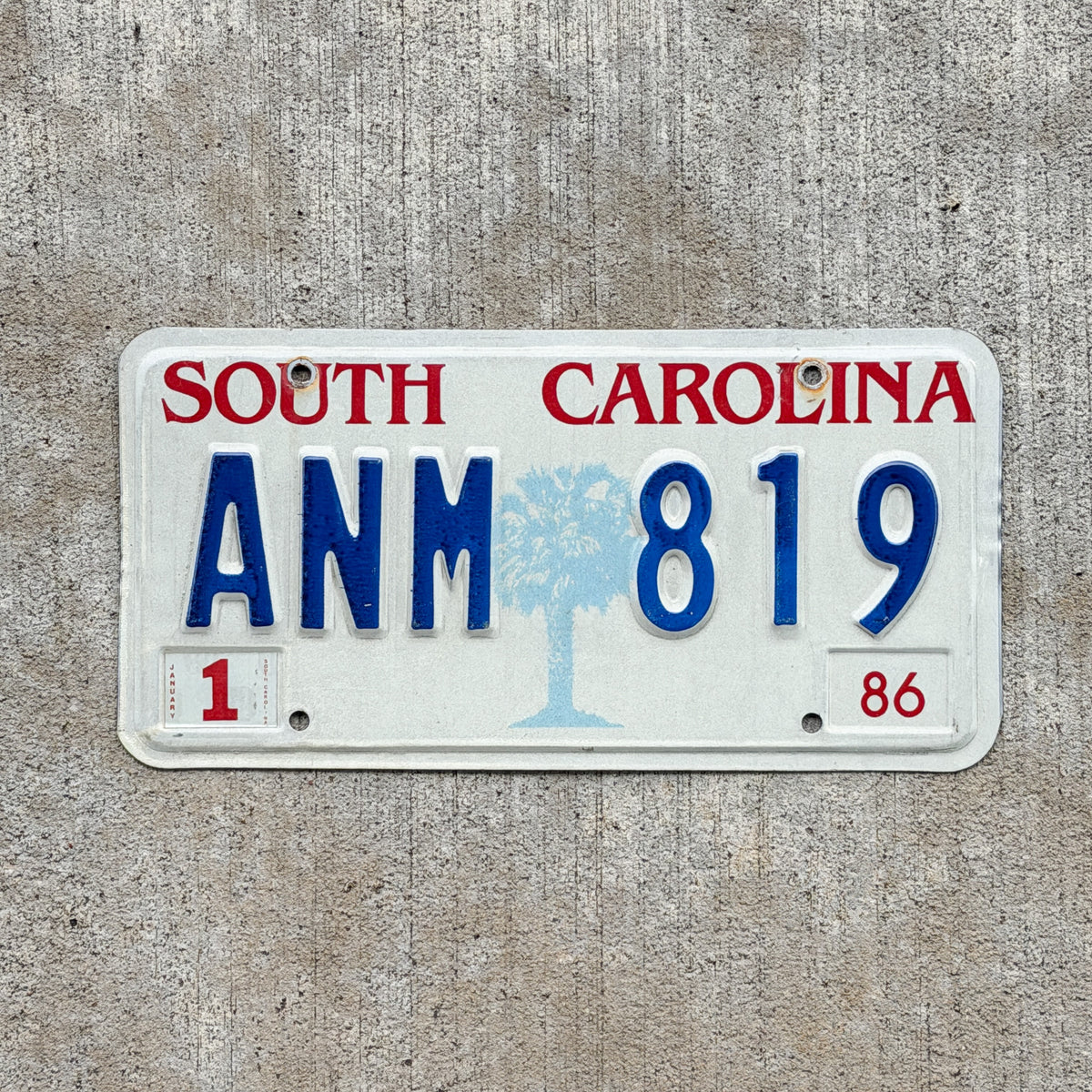 Photo of a 1986 South Carolina License Plate Auto Tag Garage Decor Vintage ANM 819 with original patina