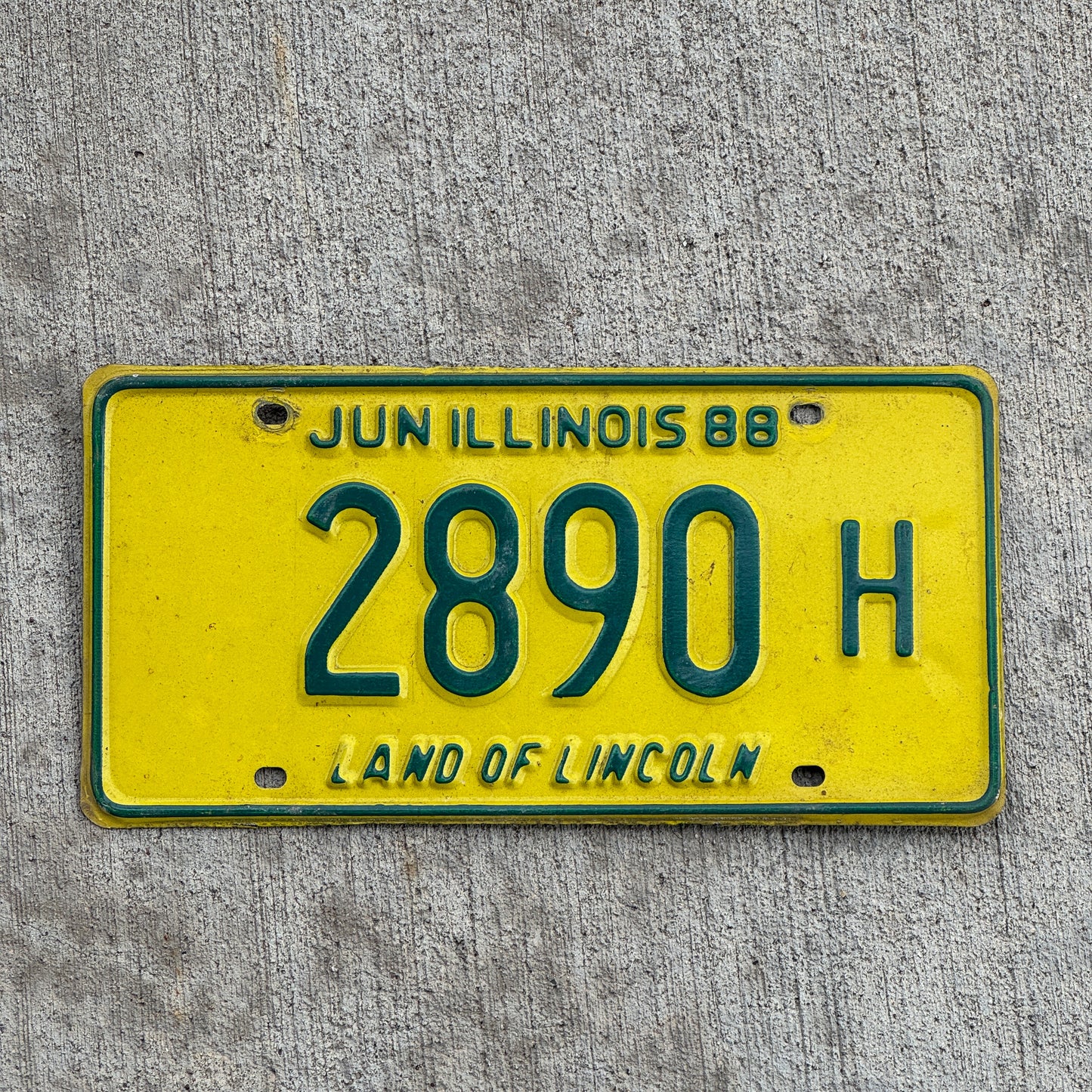 Photo of a 1987 1988 Illinois Truck License Plate Auto Tag Garage Decor Vintage 2890 H with original patina