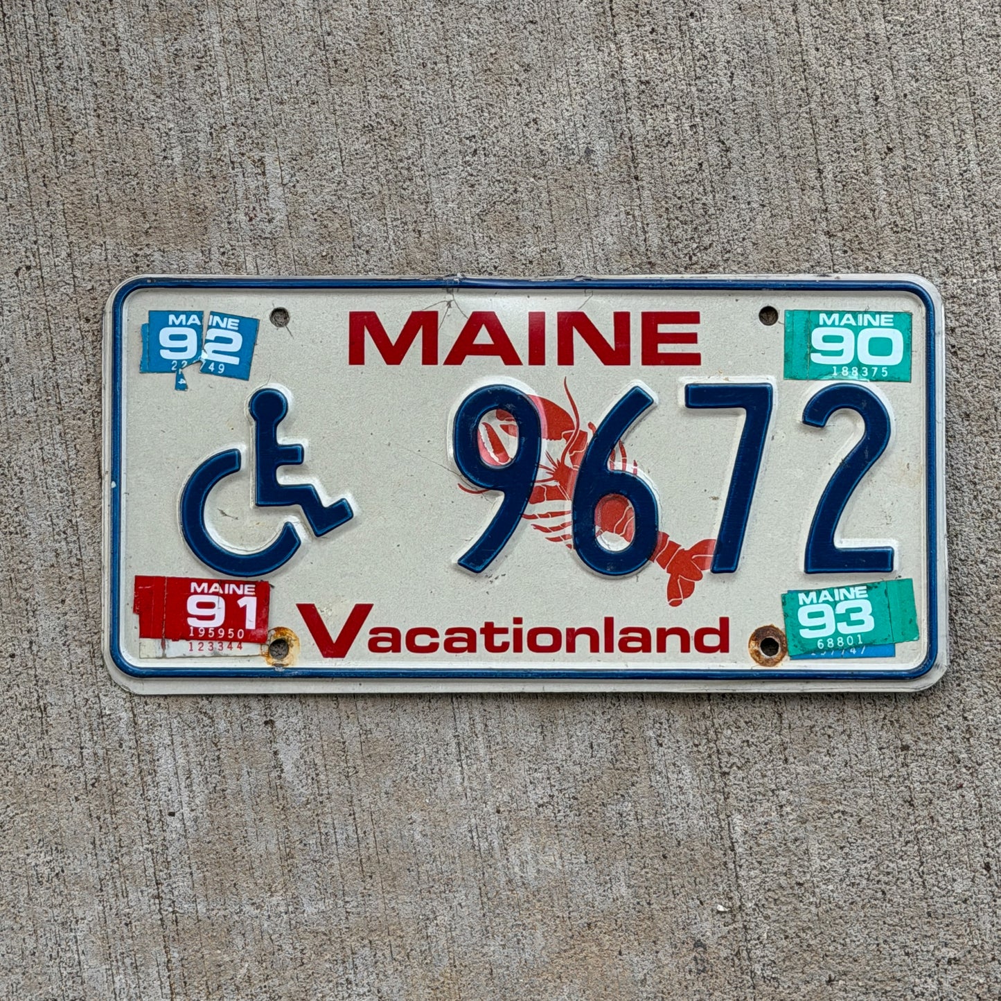 Photo of a 1987 1993 Maine Handicap License Plate Auto Tag Garage Decor Vintage Lobster 9672 with original patina