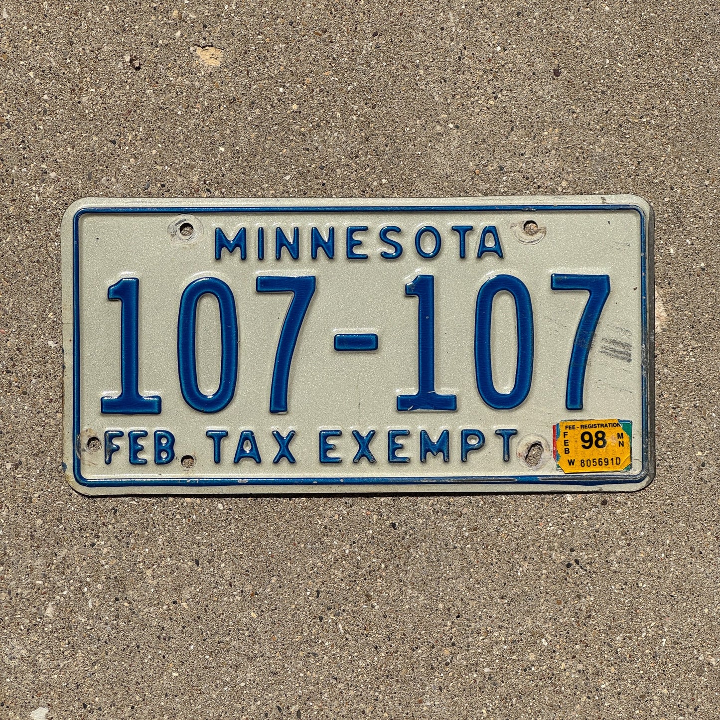 Photo of a 1987 1998 Minnesota Tax Exempt License Plate Auto Tag 2 Garage Decor Repeat Repeating 107 107