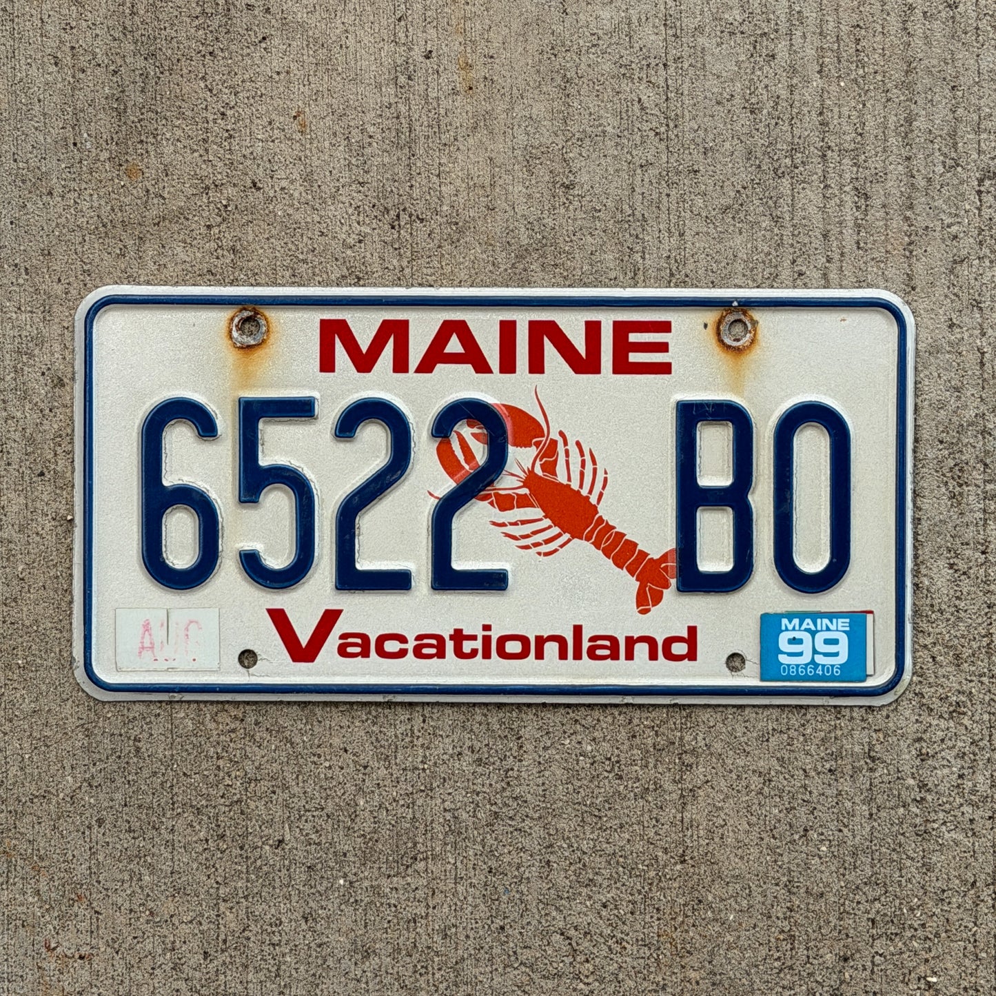Photo of a 1987 1999 Maine License Plate Auto Tag Garage Decor Vintage Lobster 6522 BO with original patina