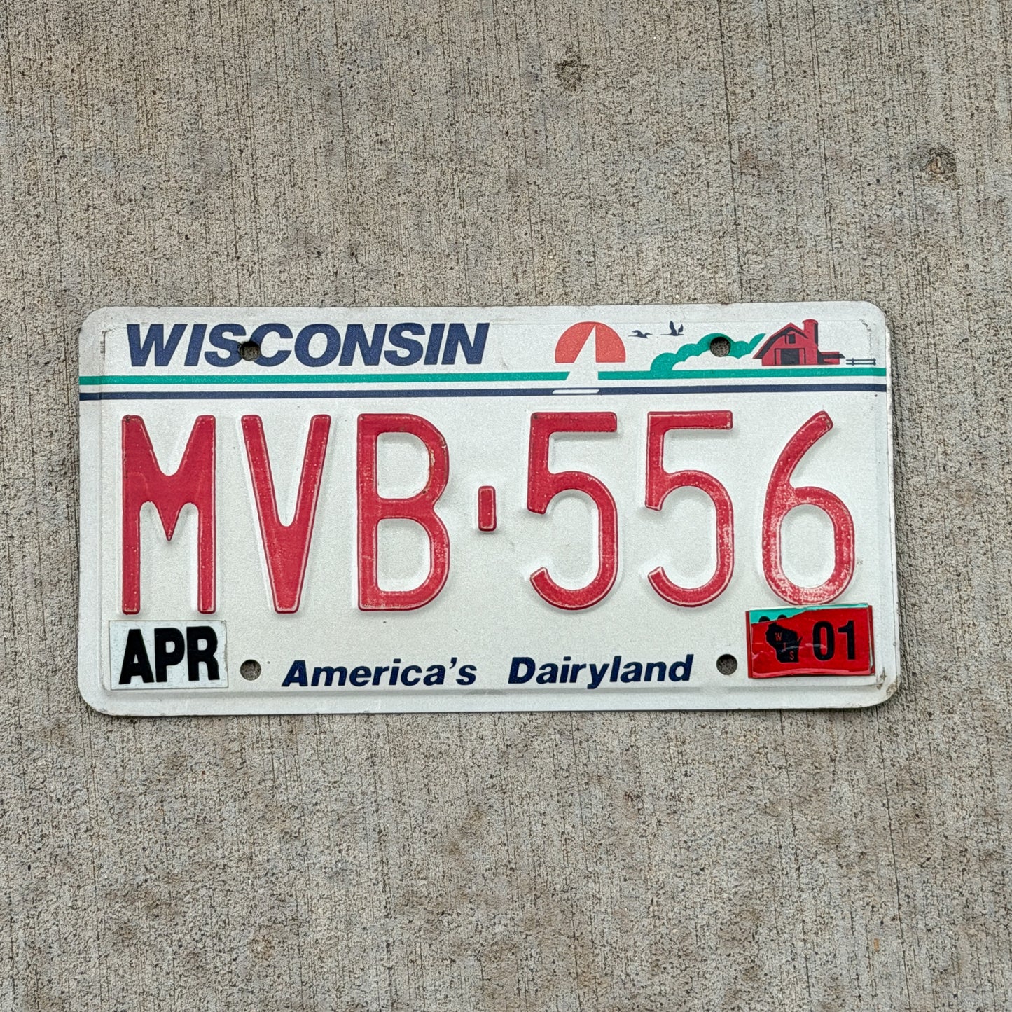 Photo of a 1987 2001 Wisconsin License Plate Auto Tag Garage Decor Vintage MVB 556 with original patina