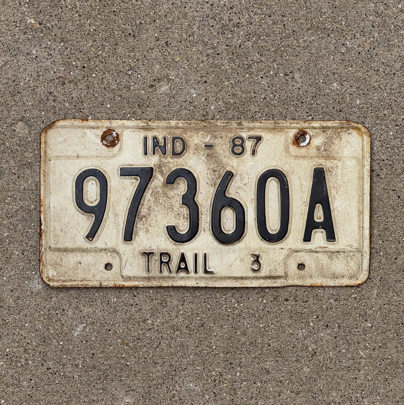 Photo of a 1987 Indiana Trailer License Plate Auto Tag Garage Decor 97360 A