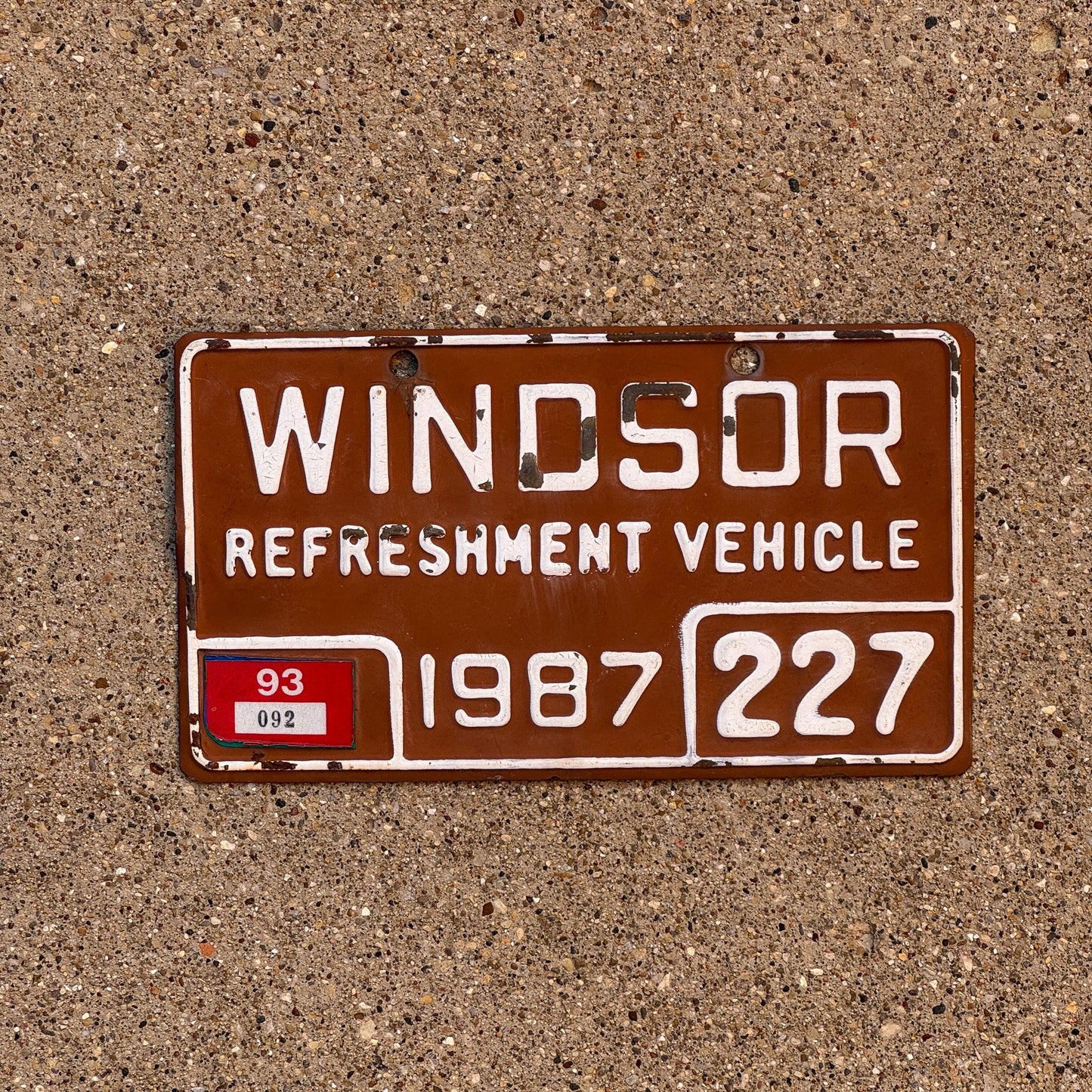 Photo of a 1987 Ontario Refreshment Vehicle License Plate Auto Tag Garage Decor Vintage Windsor 227