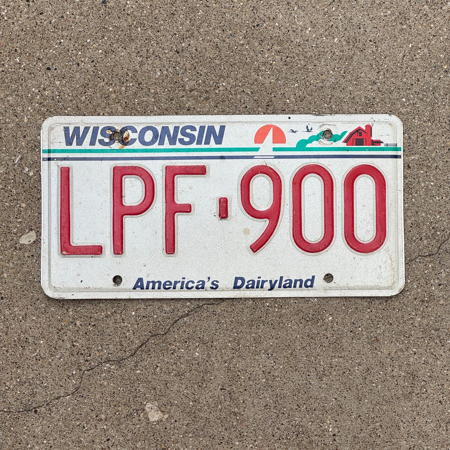 Photo of a 1987 Wisconsin License Plate Auto Tag 2 Garage Decor LPF 900