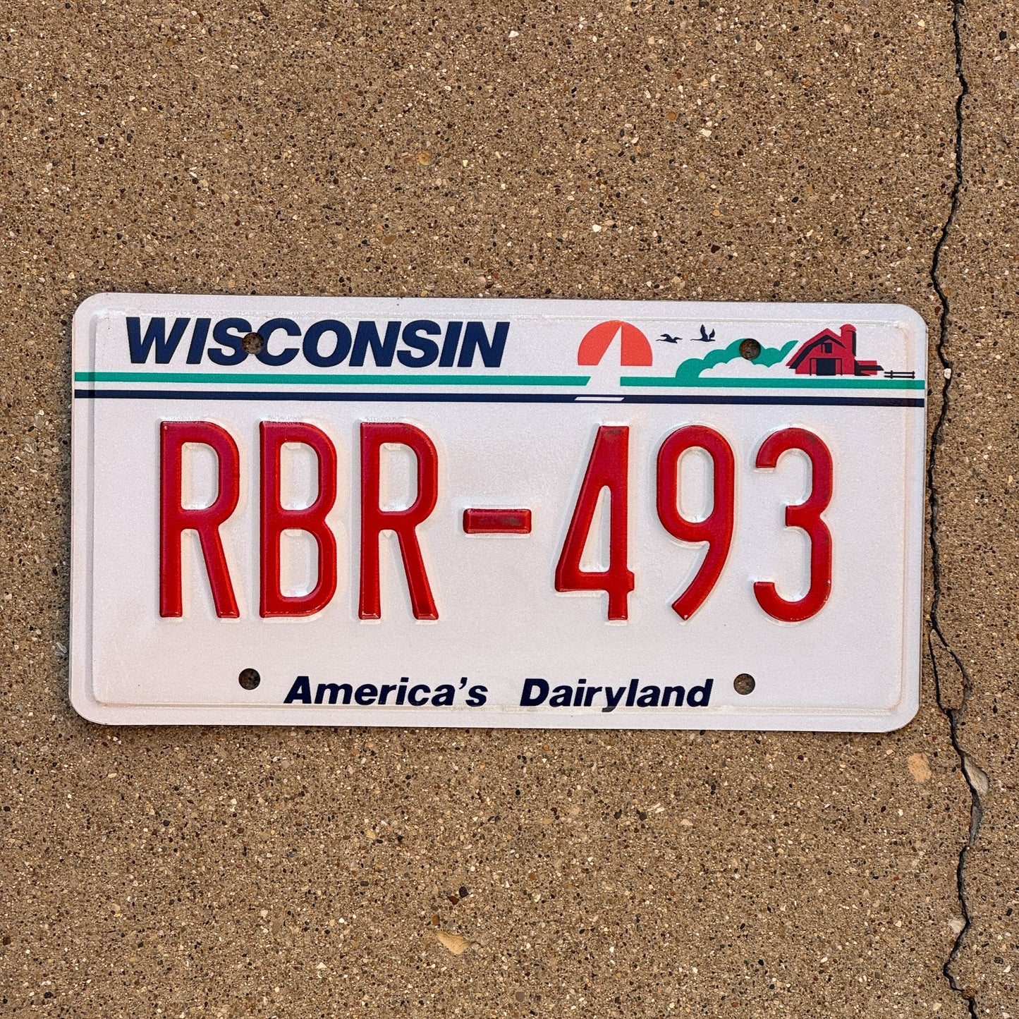 Photo of a 1987 Wisconsin License Plate Auto Tag Garage Decor Vintage RBR 493