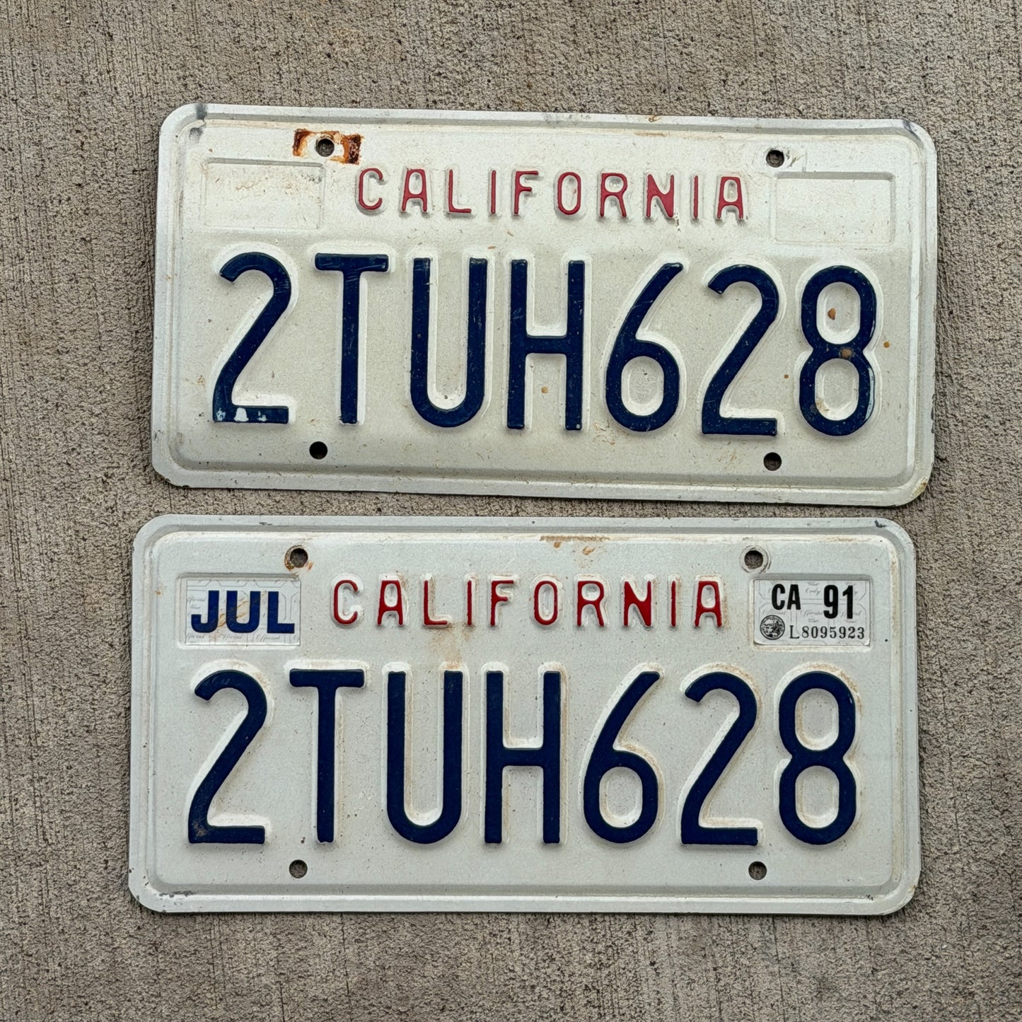 Photo of a 1988 1991 California License Plate Pair Auto Tag Garage Decor Vintage 2 TUH 628 with original patina