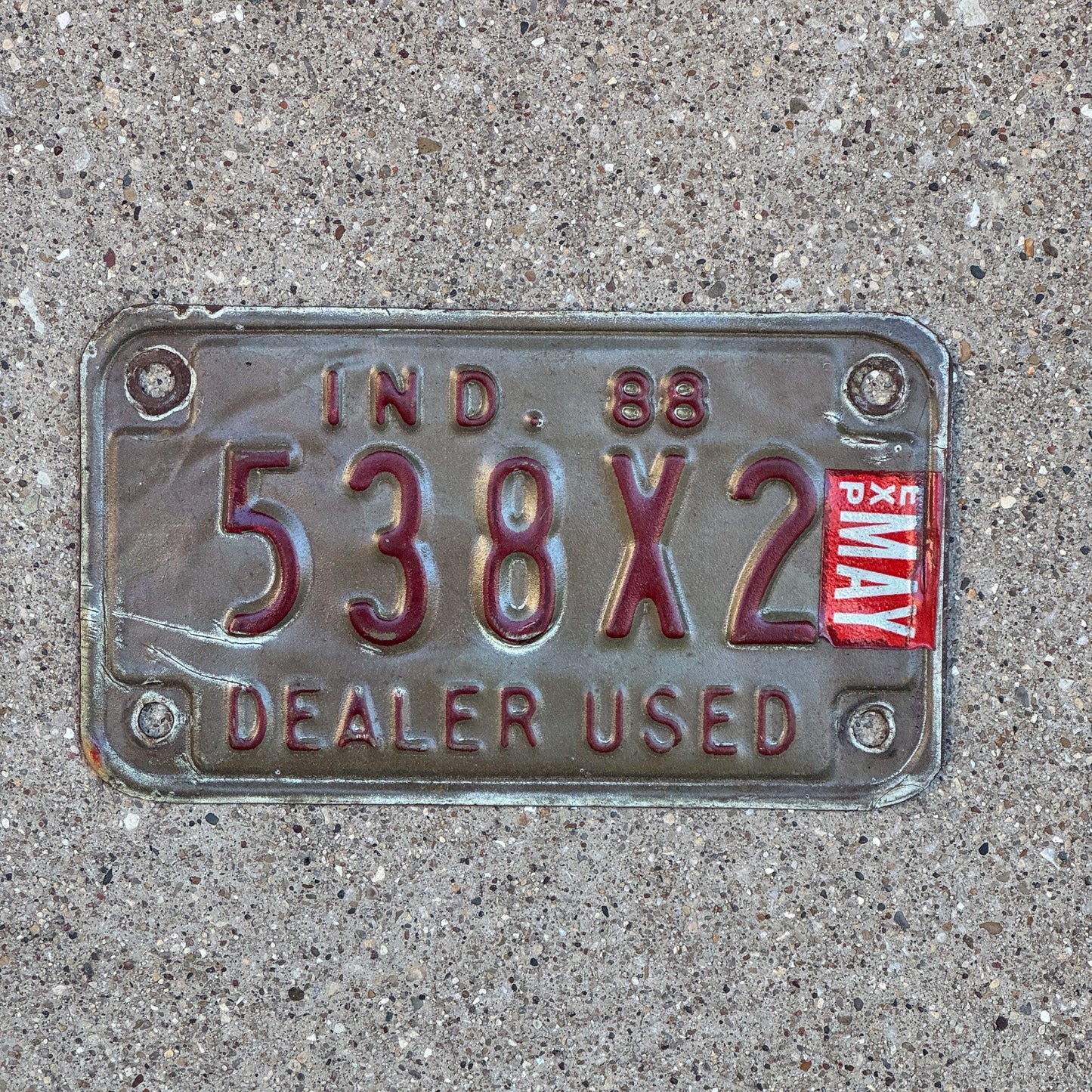 Photo of a 1988 Indiana Used Motorcycle Dealer License Plate Auto Tag Garage Decor Vintage 538 X 2 with original patina