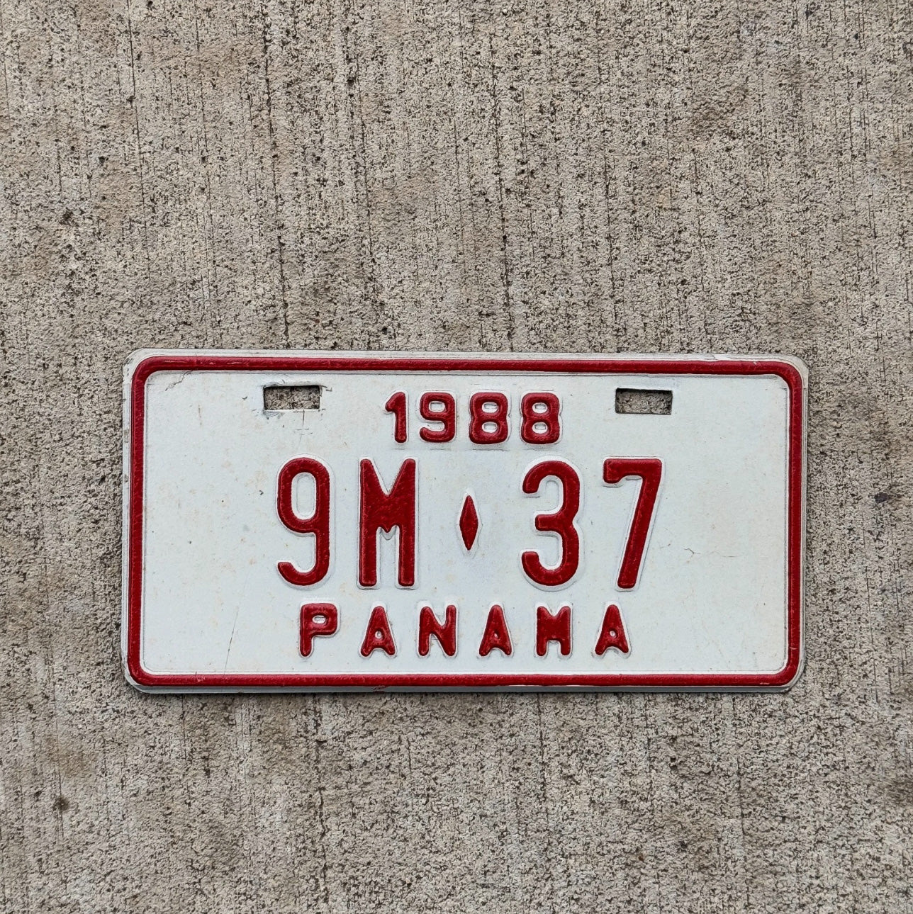 Photo of a 1988 Panama Motorcycle License Plate Auto Tag Garage Decor Vintage Small International 9M37