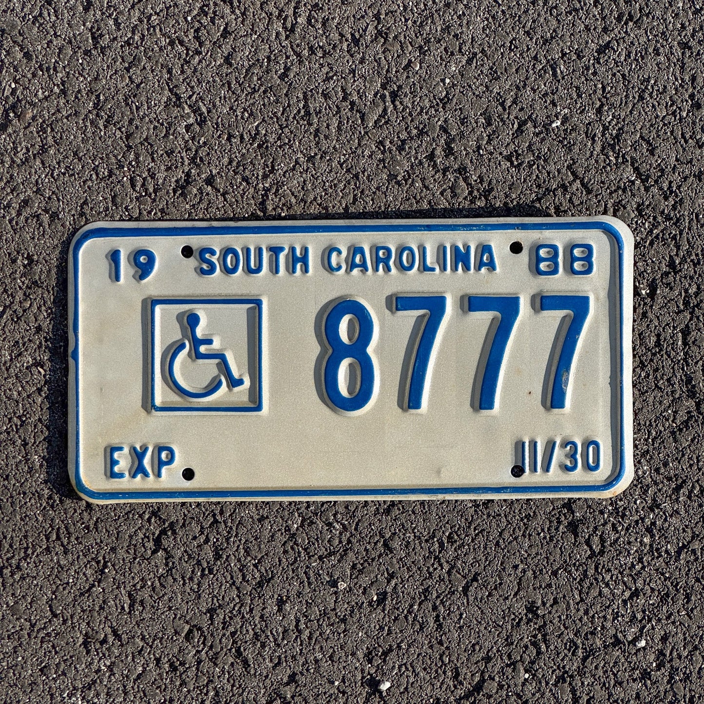 Photo of a 1988 South Carolina Handicapped License Plate Auto Tag Garage Decor Vintage Repeat Repeating 777 8777
