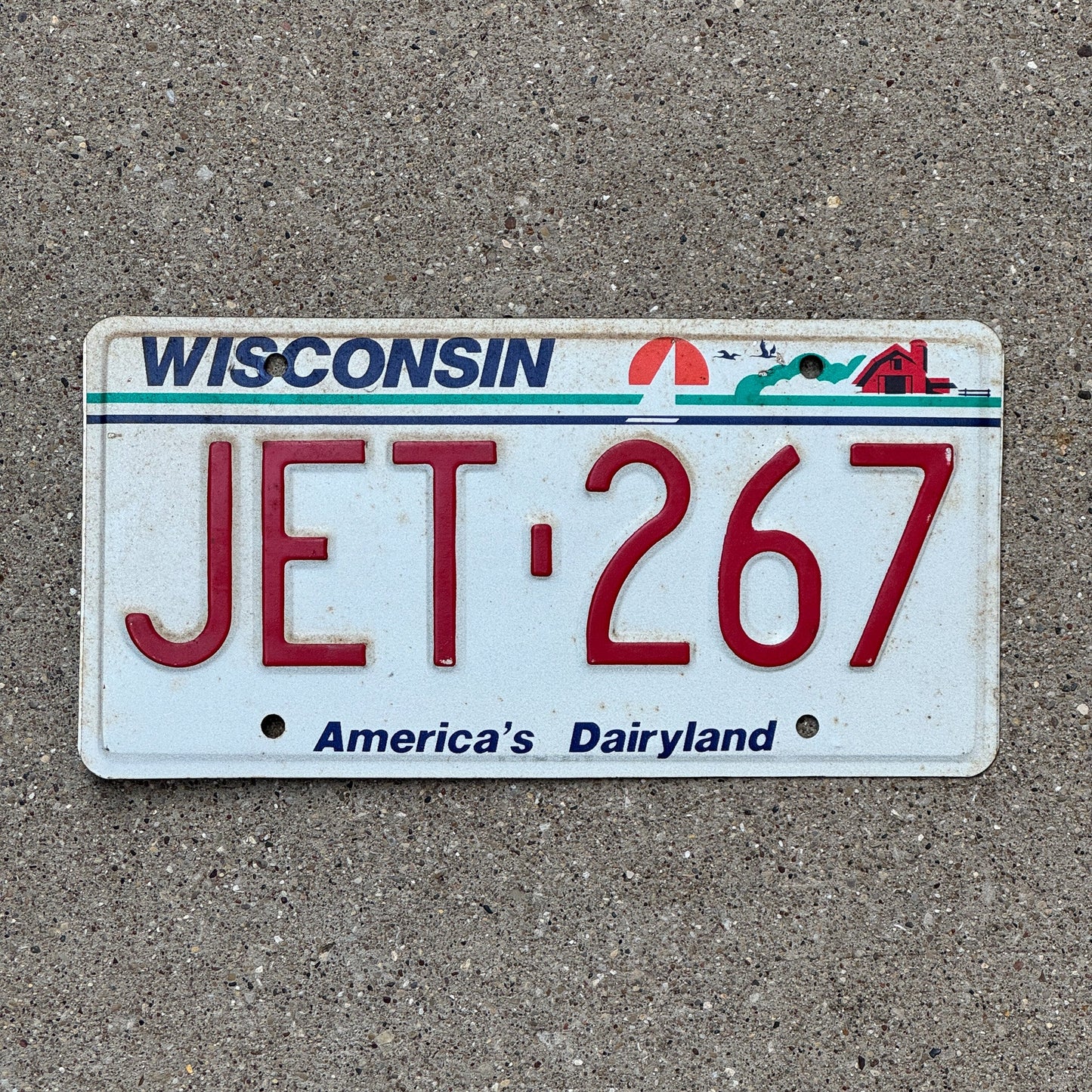 Photo of a 1988 Wisconsin License Plate Auto Tag Garage Decor Vintage Airplane Plane JET 267