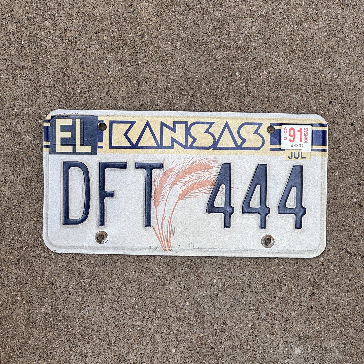 Photo of a 1989 1991 Kansas License Plate Auto Tag Garage Decor Vintage Repeat Repeating DFT 444