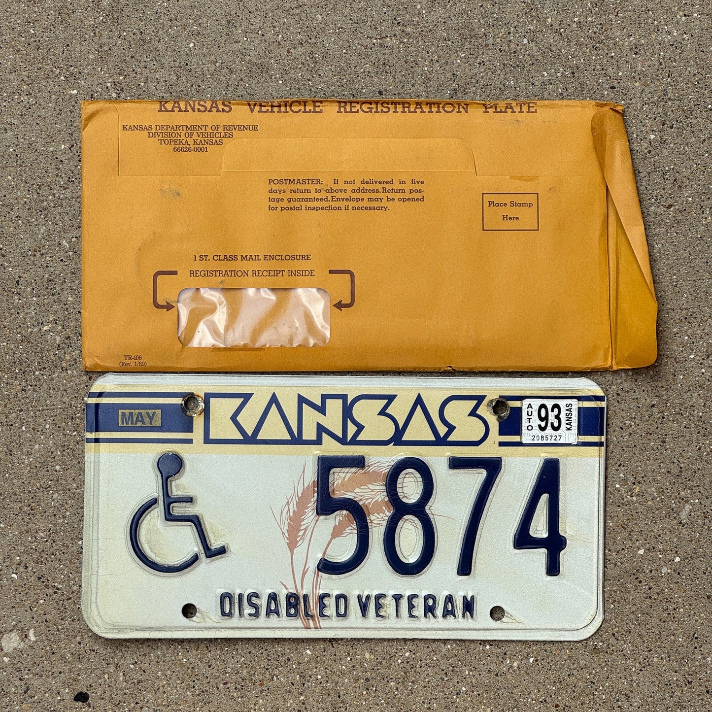 Photo of a 1989 1993 Kansas Disabled Veteran License Plate Auto Tag Garage Decor Vintage With Envelope 5874