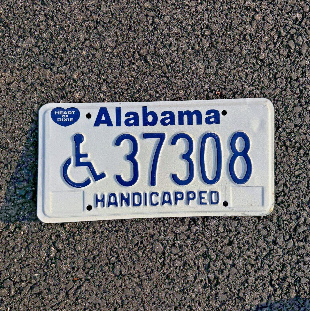Photo of a 1989 Alabama Handicap Disabled License Plate Auto Tag Garage Decor Vintage Heart of Dixie 37308